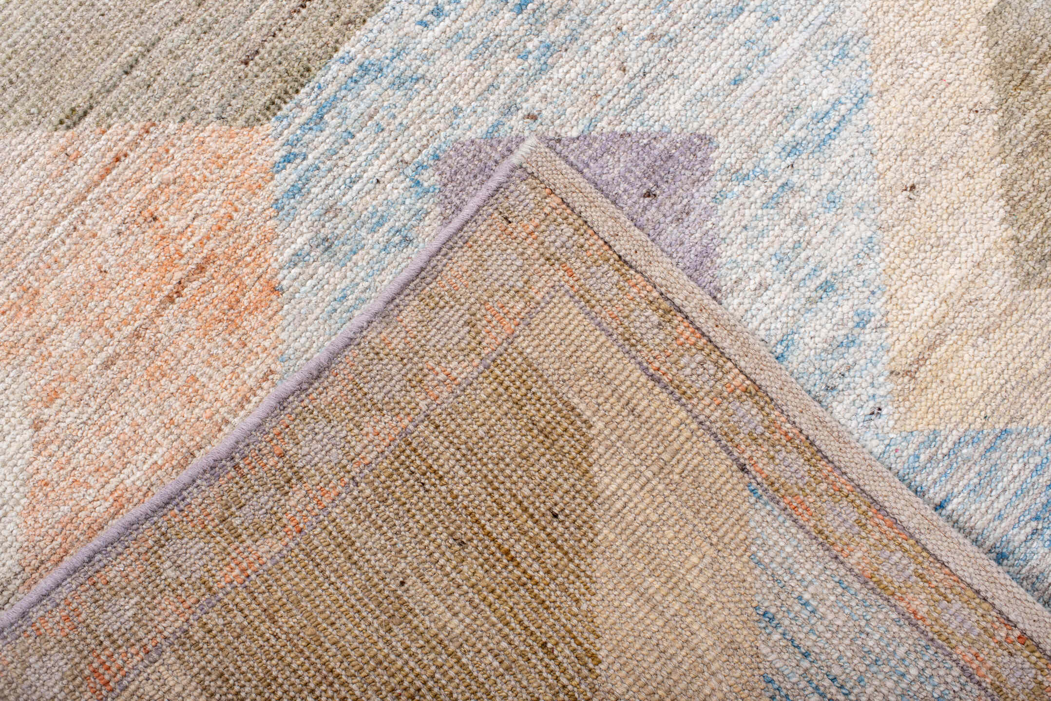 5' x 7' one-of-a-kind handmade vintage Tulu rug. Color palette: ivory, lilac, blush, pale blue, taupe, sage, purple, pink