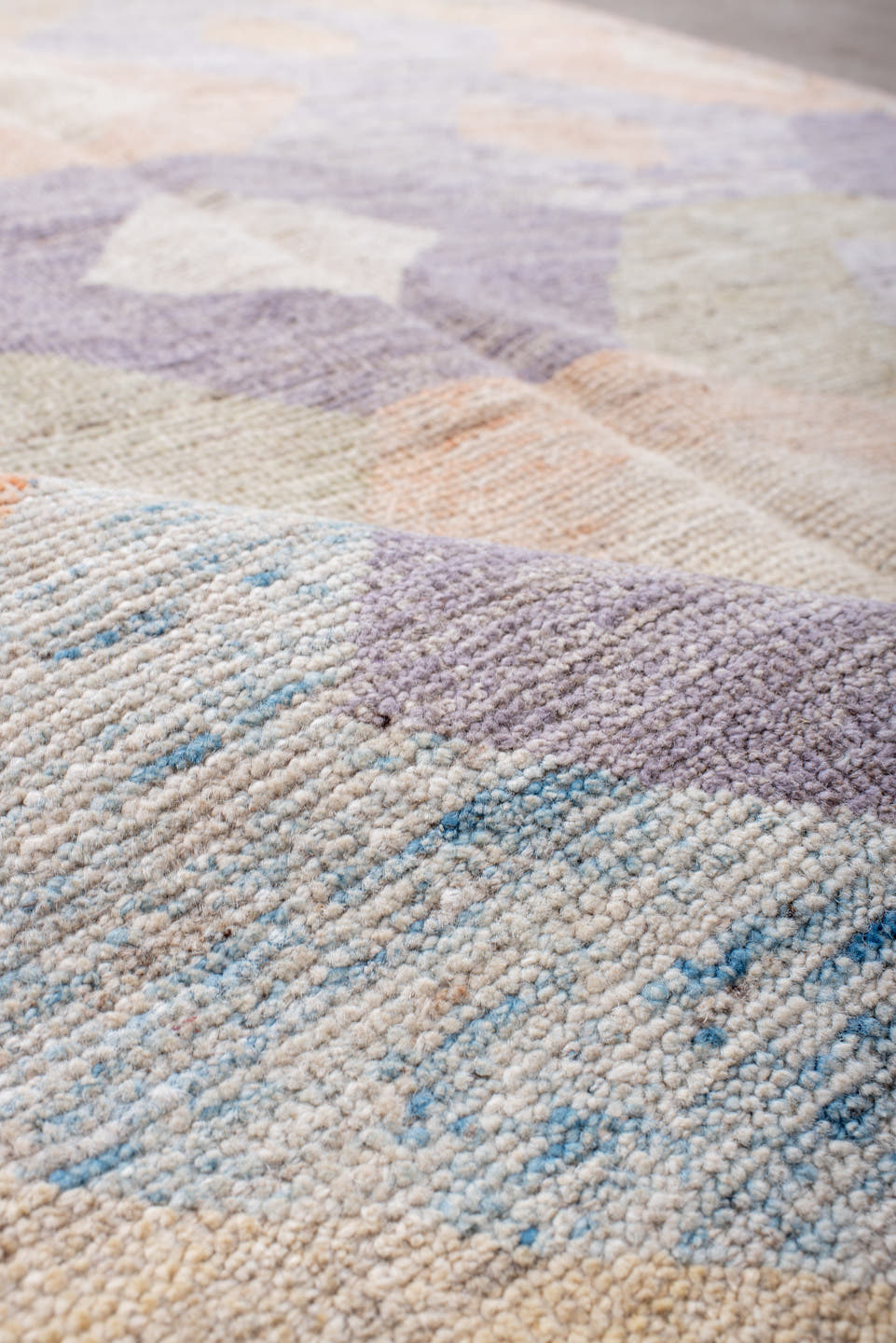 5' x 7' one-of-a-kind handmade vintage Tulu rug. Color palette: ivory, lilac, blush, pale blue, taupe, sage, purple, pink