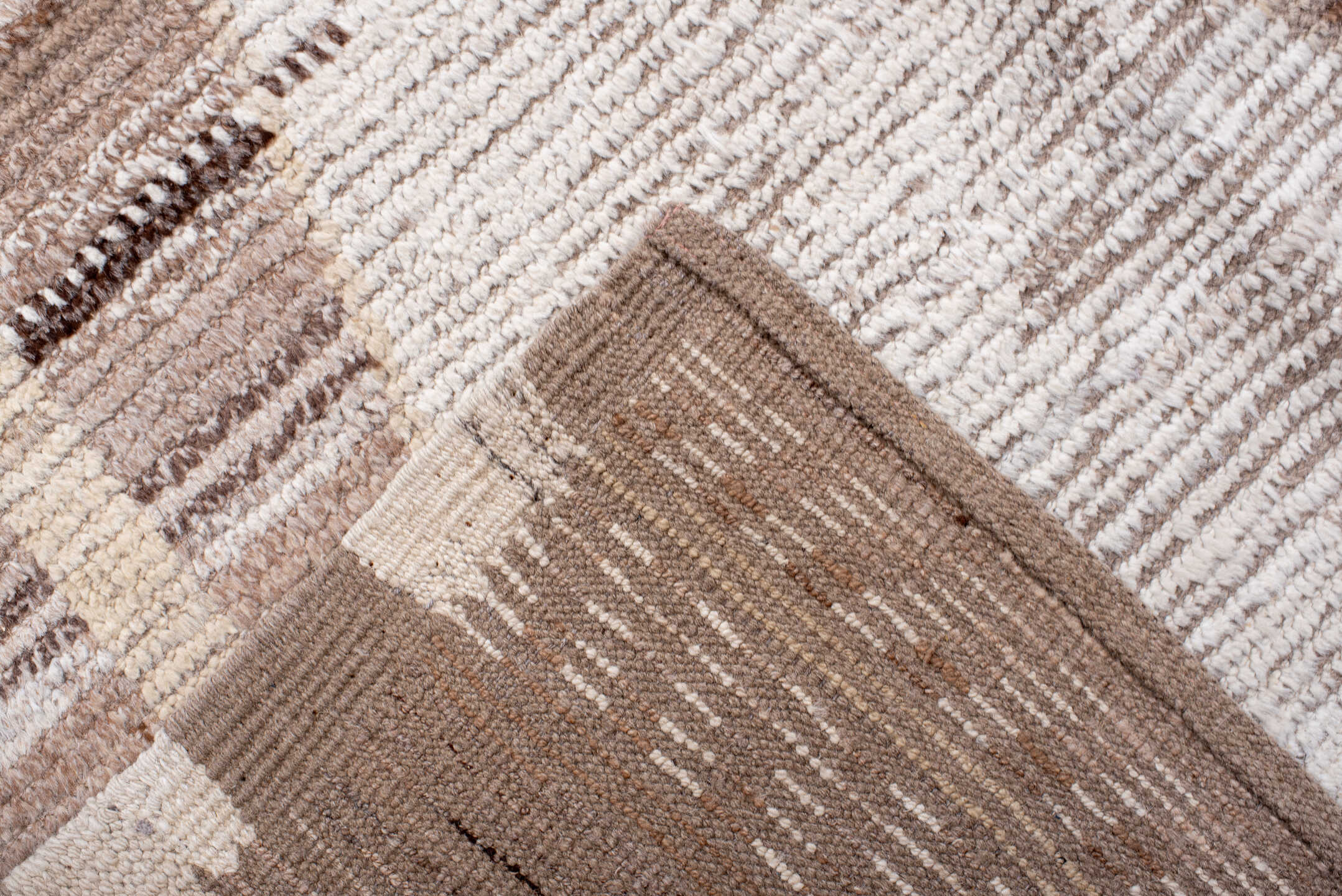 9' x 13' one-of-a-kind handmade vintage Tulu large size rug. Color palette: ivory, taupe, camel, beige, brown, gray