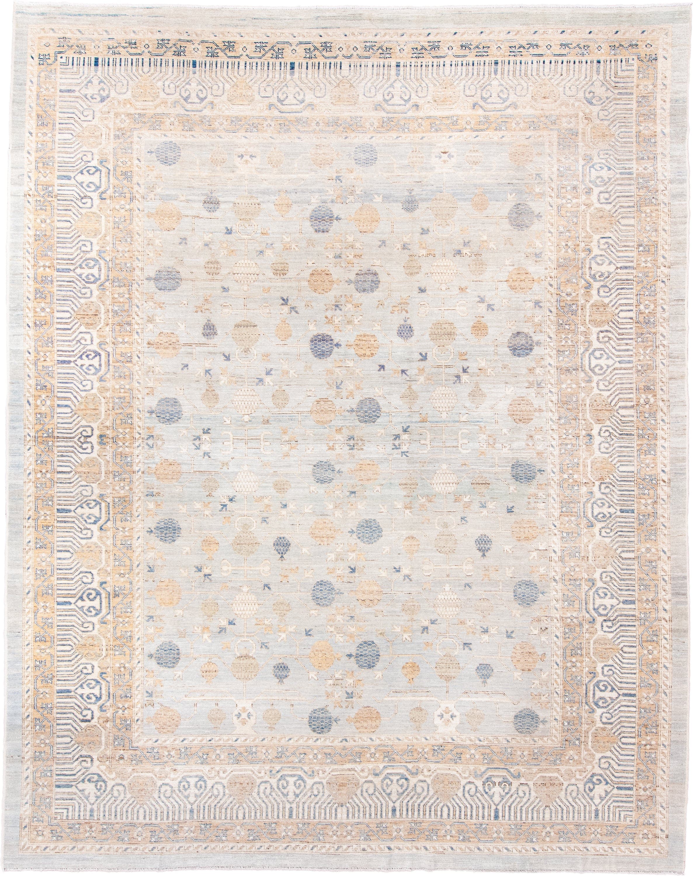 12' x 15' one-of-a-kind handmade vintage Khotan oversize rug. Color palette: ivory, pale blue, sand, beige, taupe