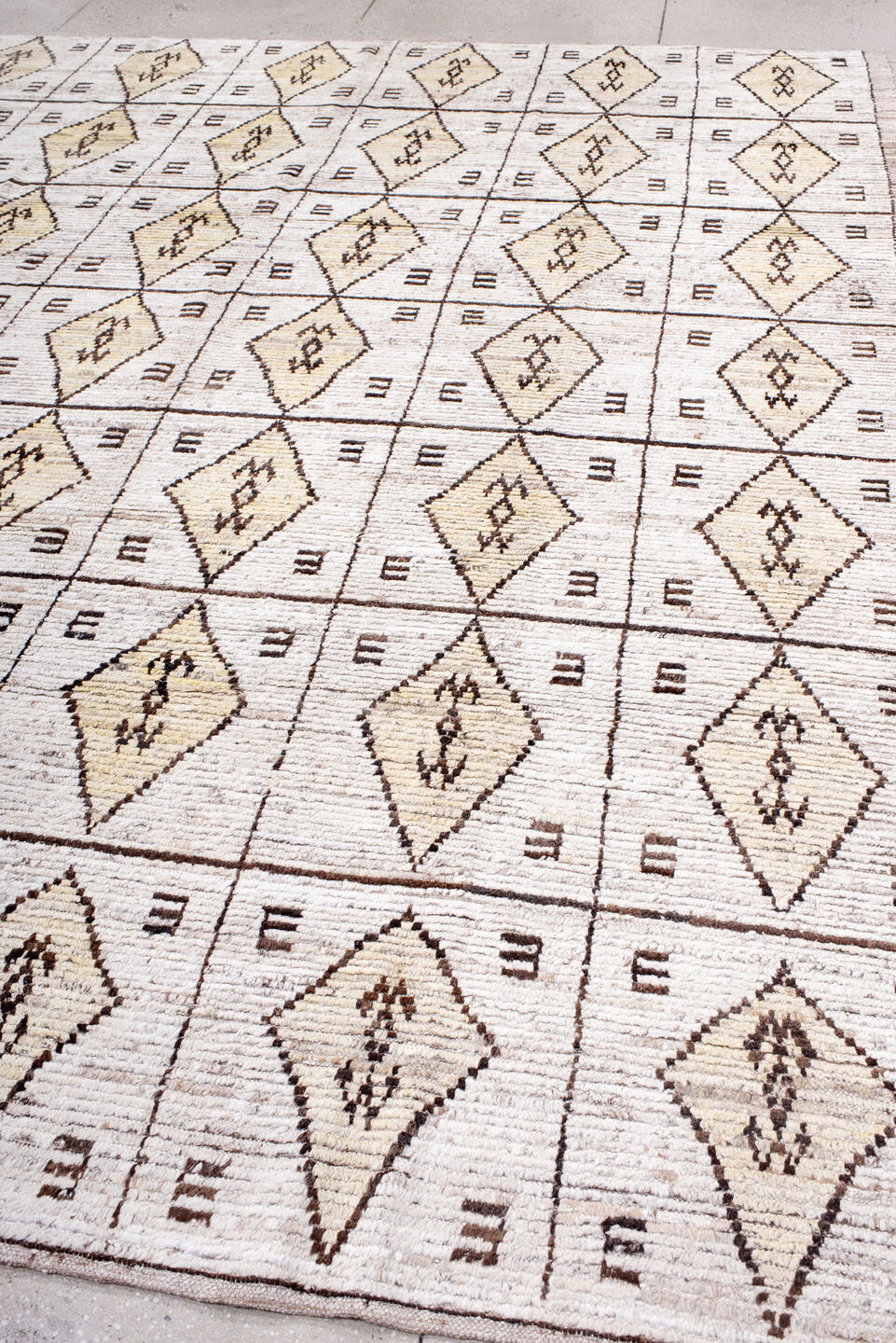 9' x 11' one-of-a-kind handmade vintage Tulu large size rug. Color palette: cream, ivory, taupe, brown, camel, beige, gray