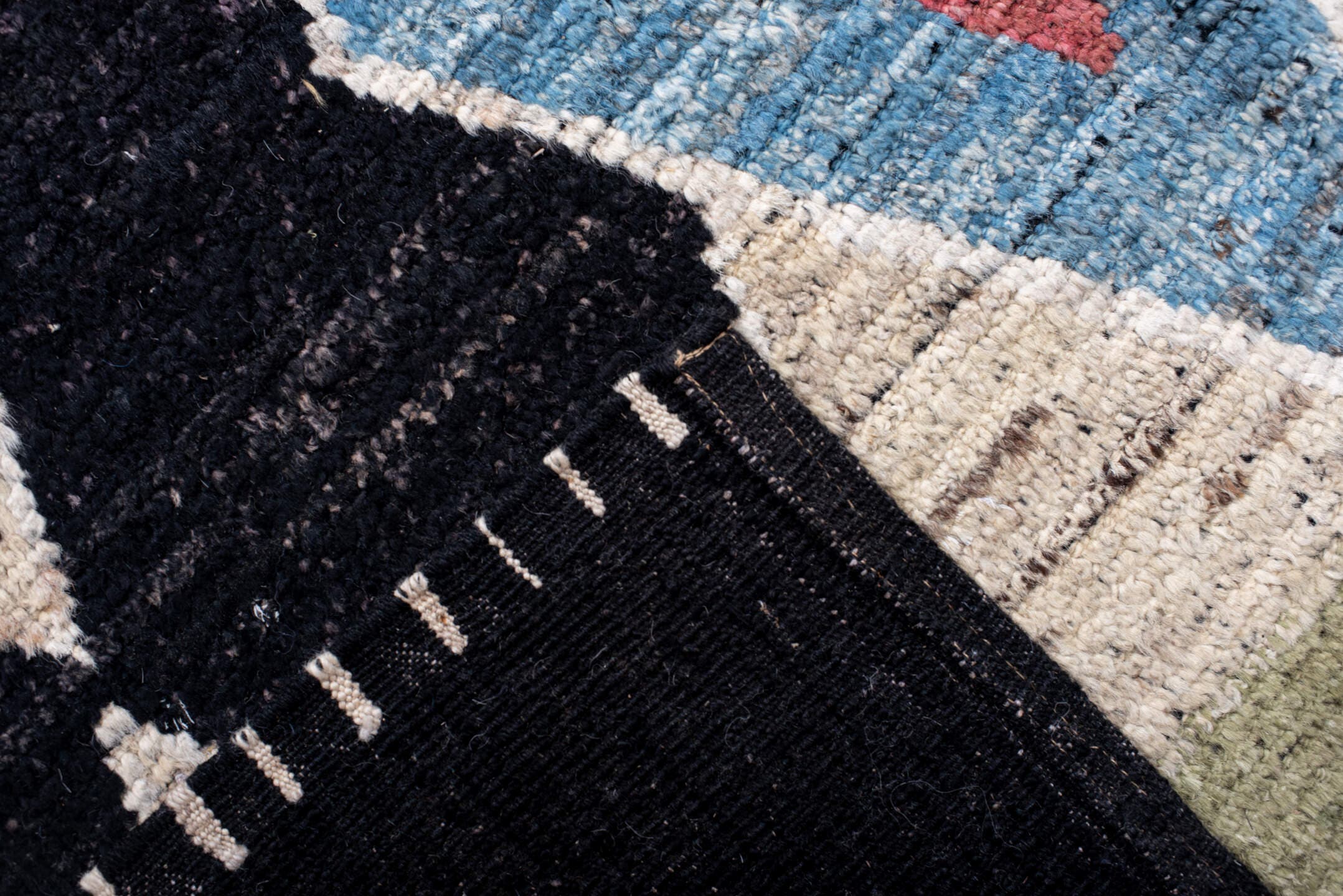 10' x 13' one-of-a-kind handmade vintage Tulu large size rug. Color palette: charcoal, ivory, camel, sky_blue, crimson, sage