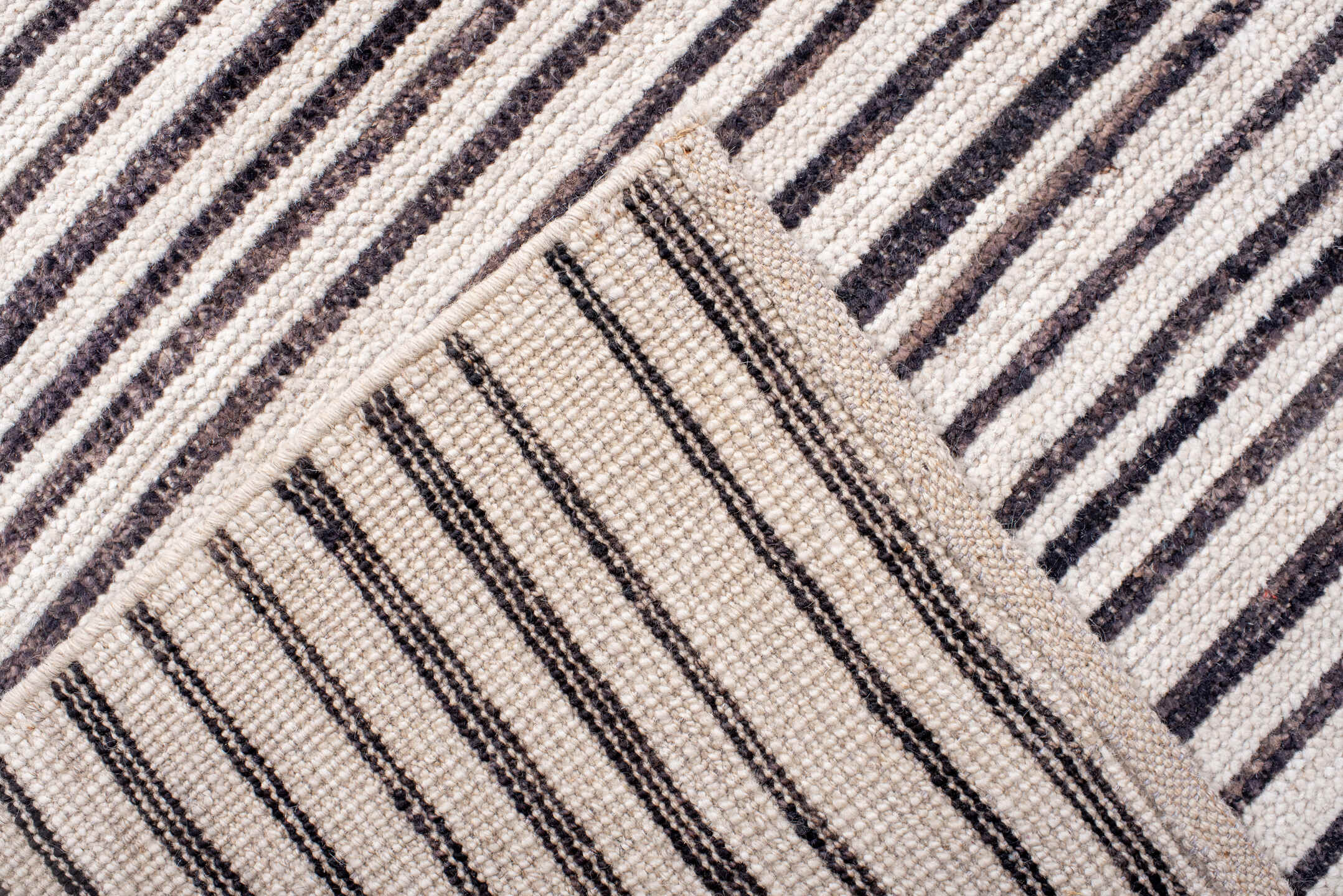10' x 13' one-of-a-kind handmade vintage Tulu large size rug. Color palette: ivory, charcoal, gray, black