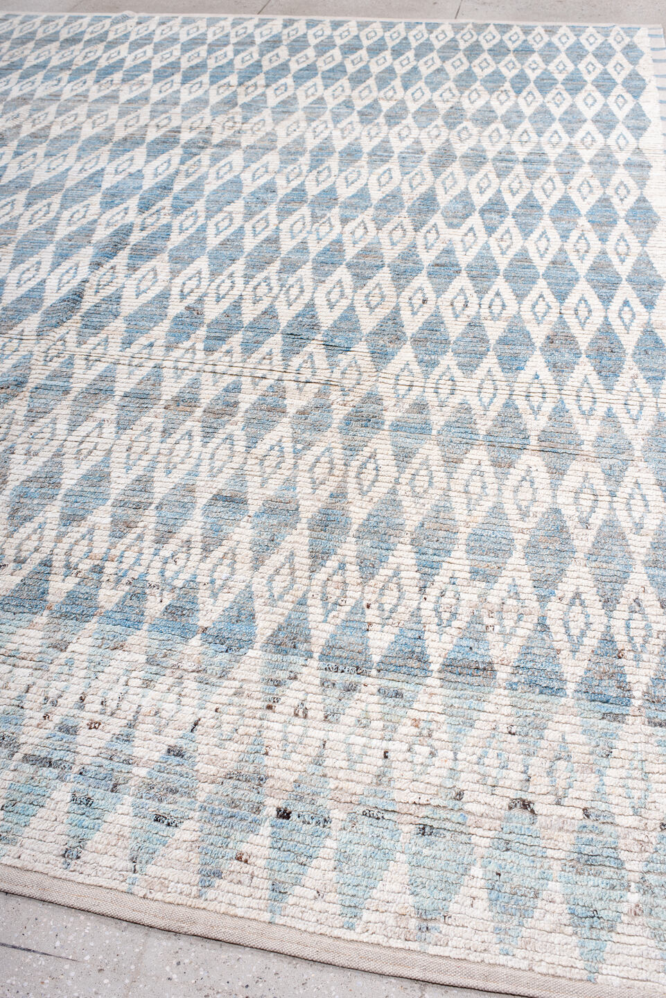 10' x 13' one-of-a-kind handmade vintage Tulu large size rug. Color palette: ivory, sky blue, pale blue, taupe, light blue