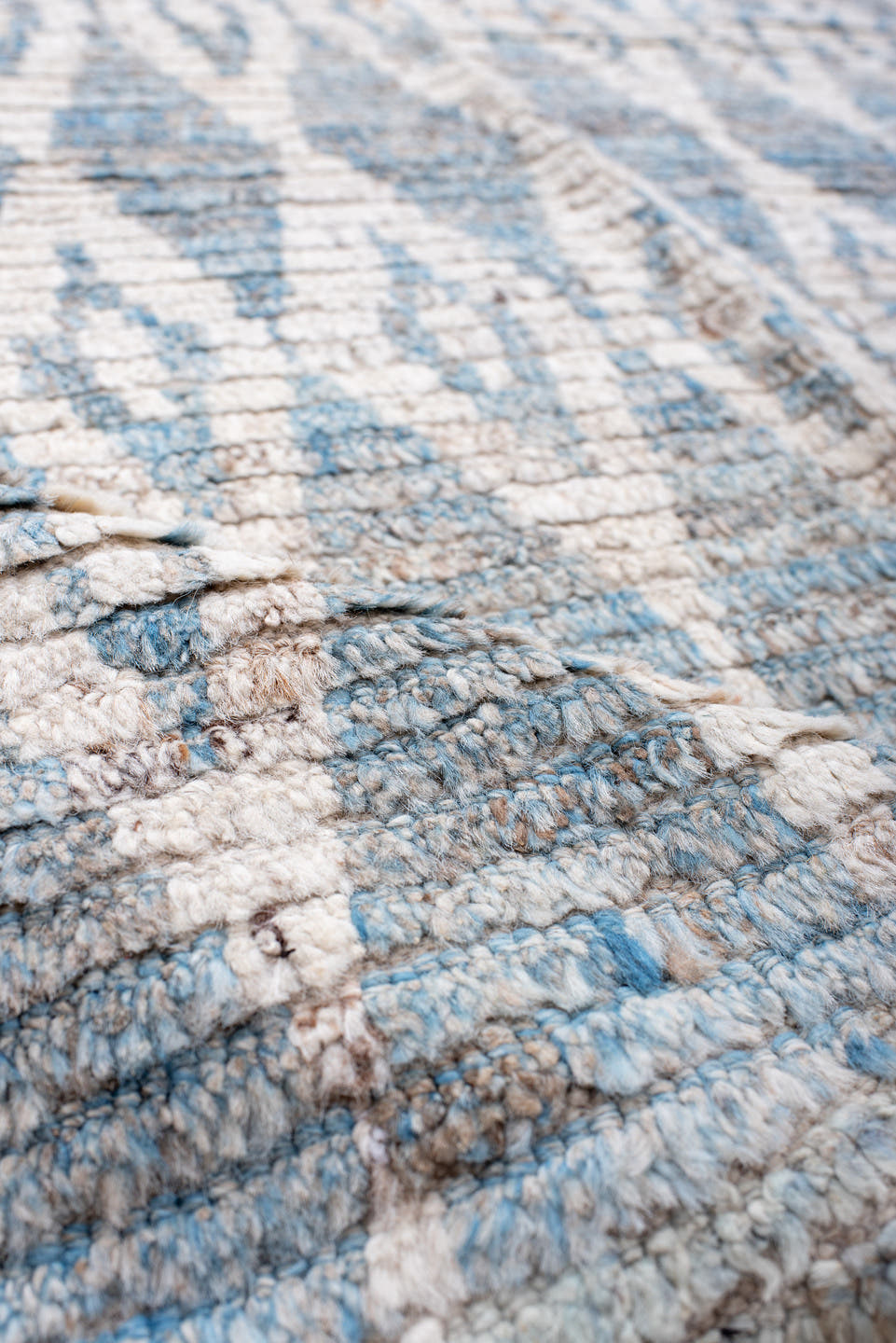 10' x 13' one-of-a-kind handmade vintage Tulu large size rug. Color palette: ivory, sky blue, pale blue, taupe, light blue