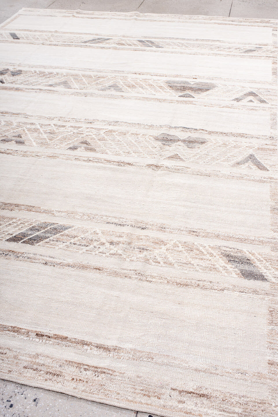 8' x 12' one-of-a-kind handmade vintage Tulu large size rug. Color palette: ivory, cream, taupe, light gray, beige, gray