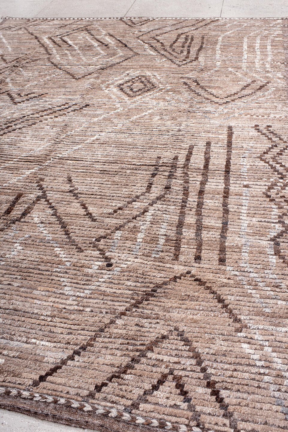 9' x 12' one-of-a-kind handmade vintage Tulu large size rug. Color palette: taupe, ivory, brown, camel, beige, gray