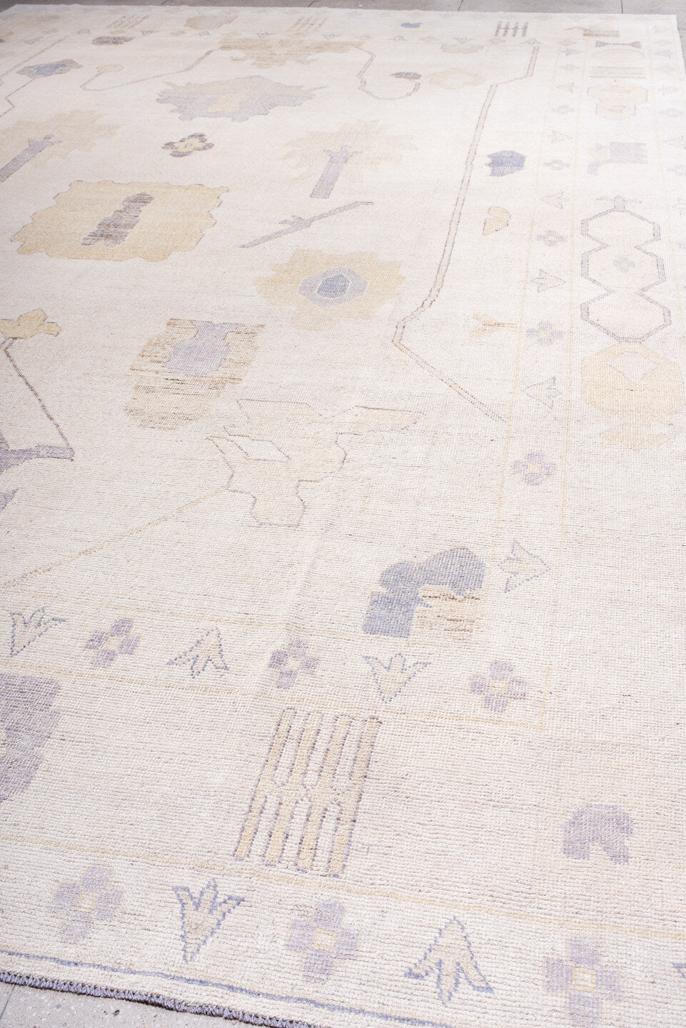 13' x 19' one-of-a-kind handmade vintage Oushak oversize rug. Color palette: ivory, lavender, cream, pale gold, beige, taupe
