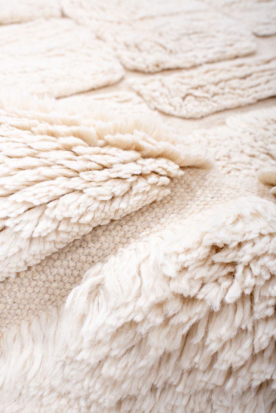 5' x 7' one-of-a-kind handmade vintage Moroccan medium size rug. Color palette: ivory, cream, beige