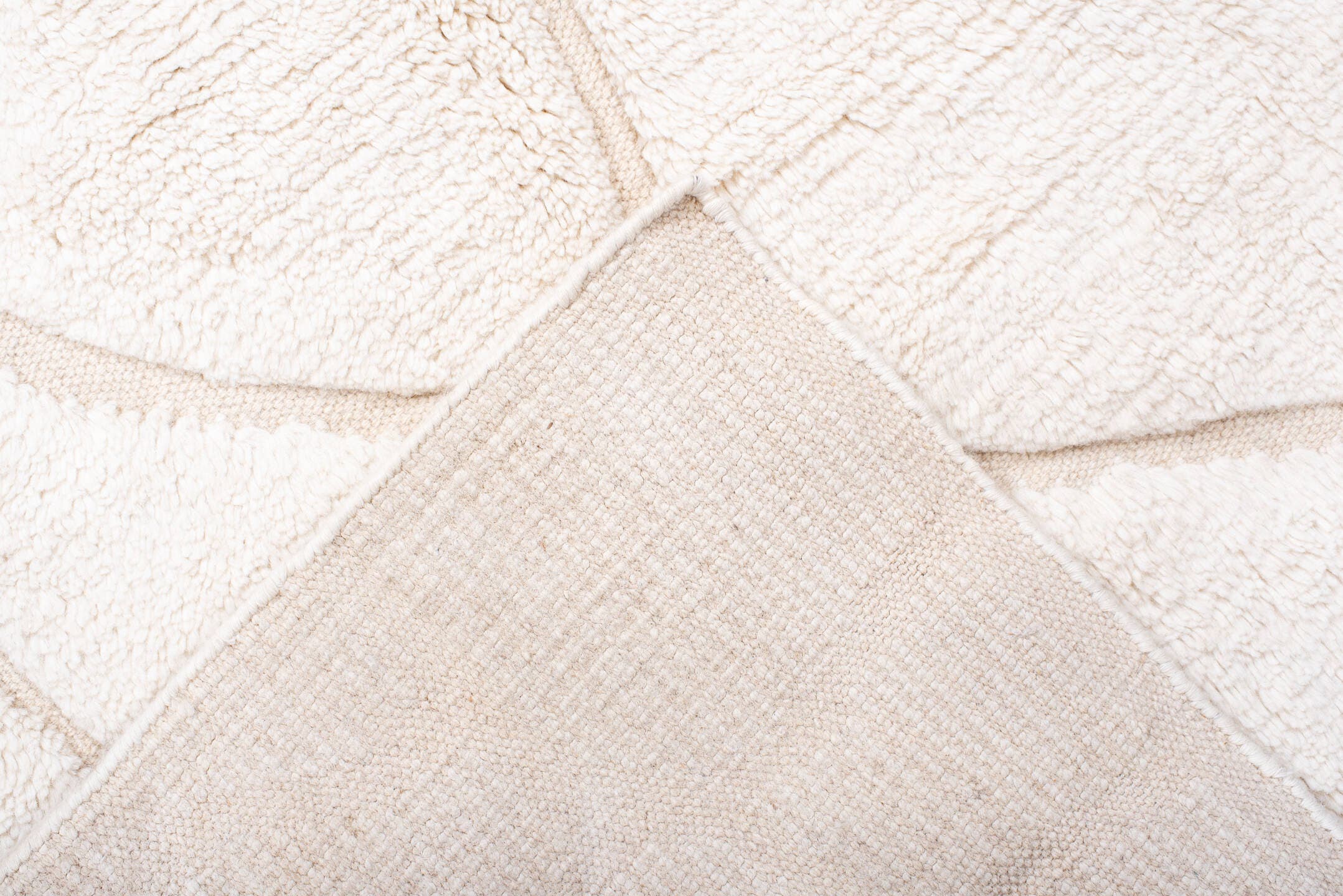 5' x 8' one-of-a-kind handmade vintage Moroccan medium size rug. Color palette: ivory, cream, beige