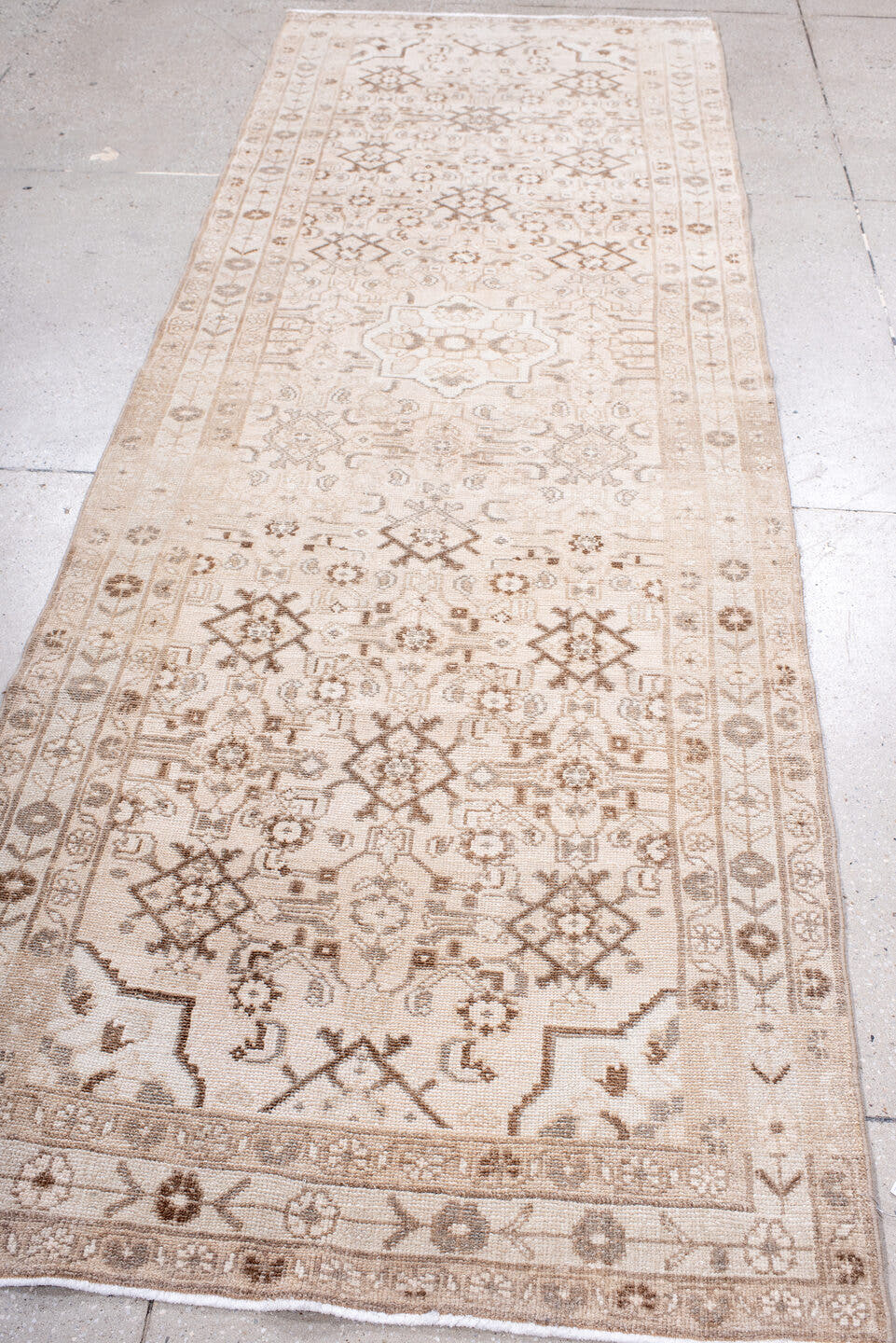 3' x 9' one-of-a-kind handmade antique Hamadan runner rug. Color palette: ivory, taupe, camel, beige, light brown, gray
