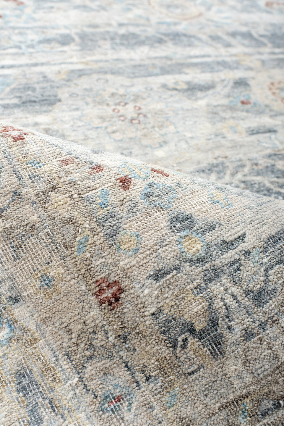 7' x 9' one-of-a-kind handmade vintage India large size rug. Color palette: ivory, pale blue, sky blue, rust, taupe, slate