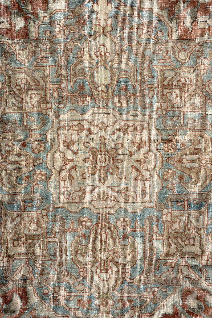 7' x 9' one-of-a-kind handmade antique Heriz rug. Color palette: ivory, sky blue, rust, taupe, camel, brown, light blue