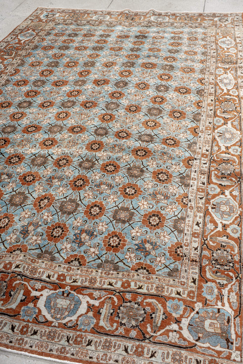 6' x 10' one-of-a-kind handmade antique Varamin large size rug. Color palette: sky blue, rust, ivory, taupe, brown, camel