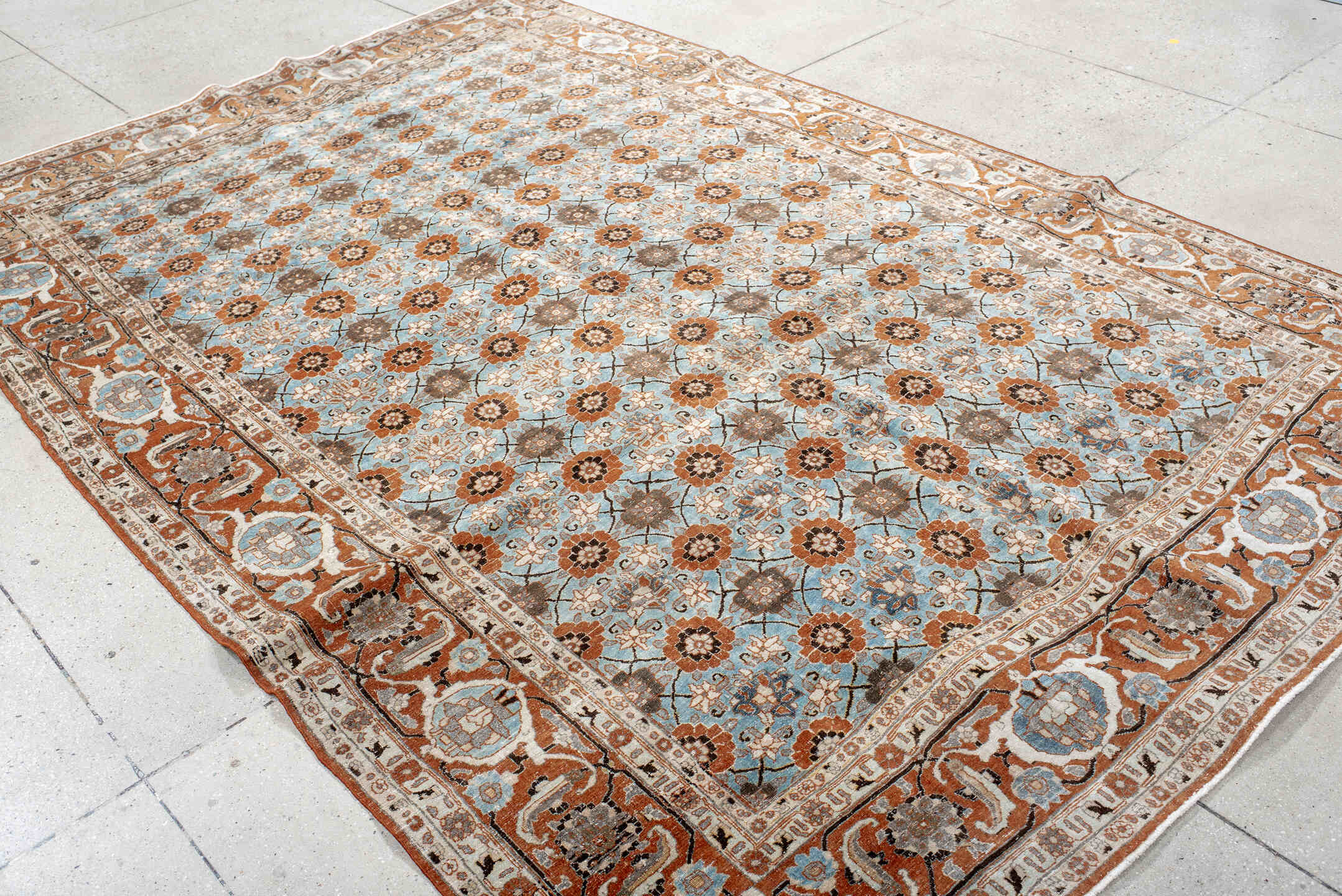 6' x 10' one-of-a-kind handmade antique Varamin large size rug. Color palette: sky blue, rust, ivory, taupe, brown, camel