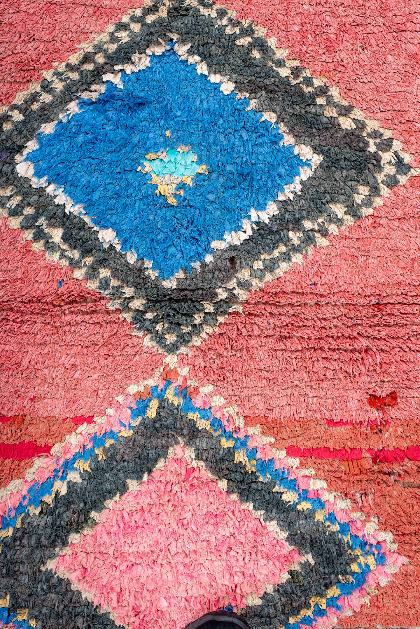 3' x 4' one-of-a-kind handmade vintage Rag Rug small size rug. Color palette: rose, charcoal, ivory, electric blue, coral