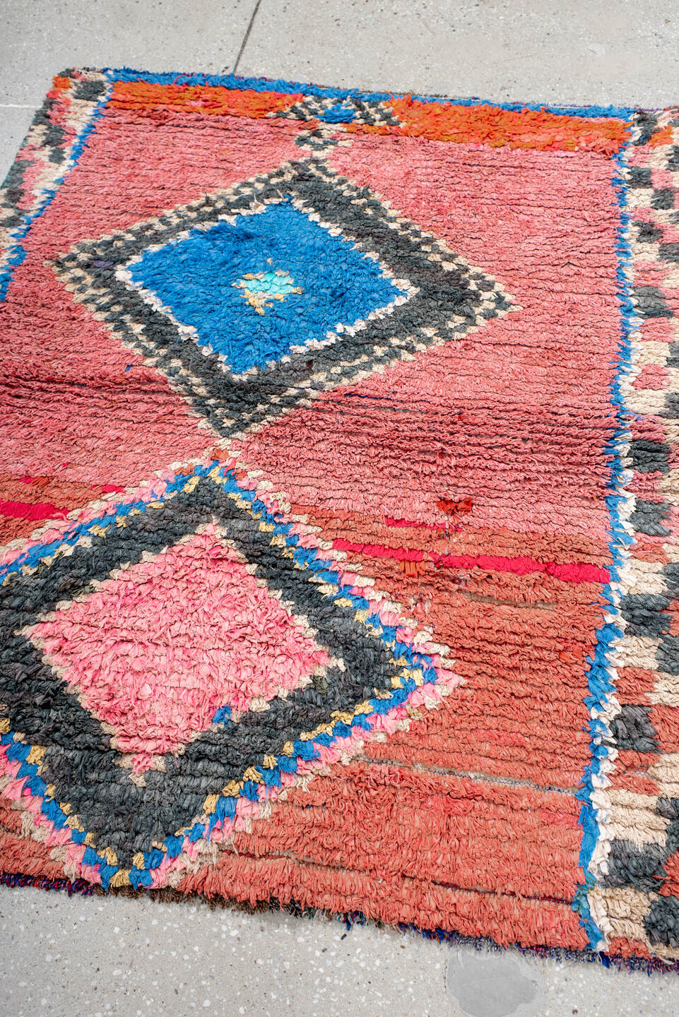 3' x 4' one-of-a-kind handmade vintage Rag Rug small size rug. Color palette: rose, charcoal, ivory, electric blue, coral