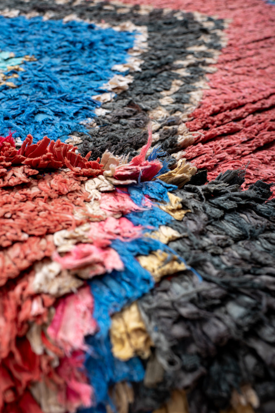 3' x 4' one-of-a-kind handmade vintage Rag Rug small size rug. Color palette: rose, charcoal, ivory, electric blue, coral
