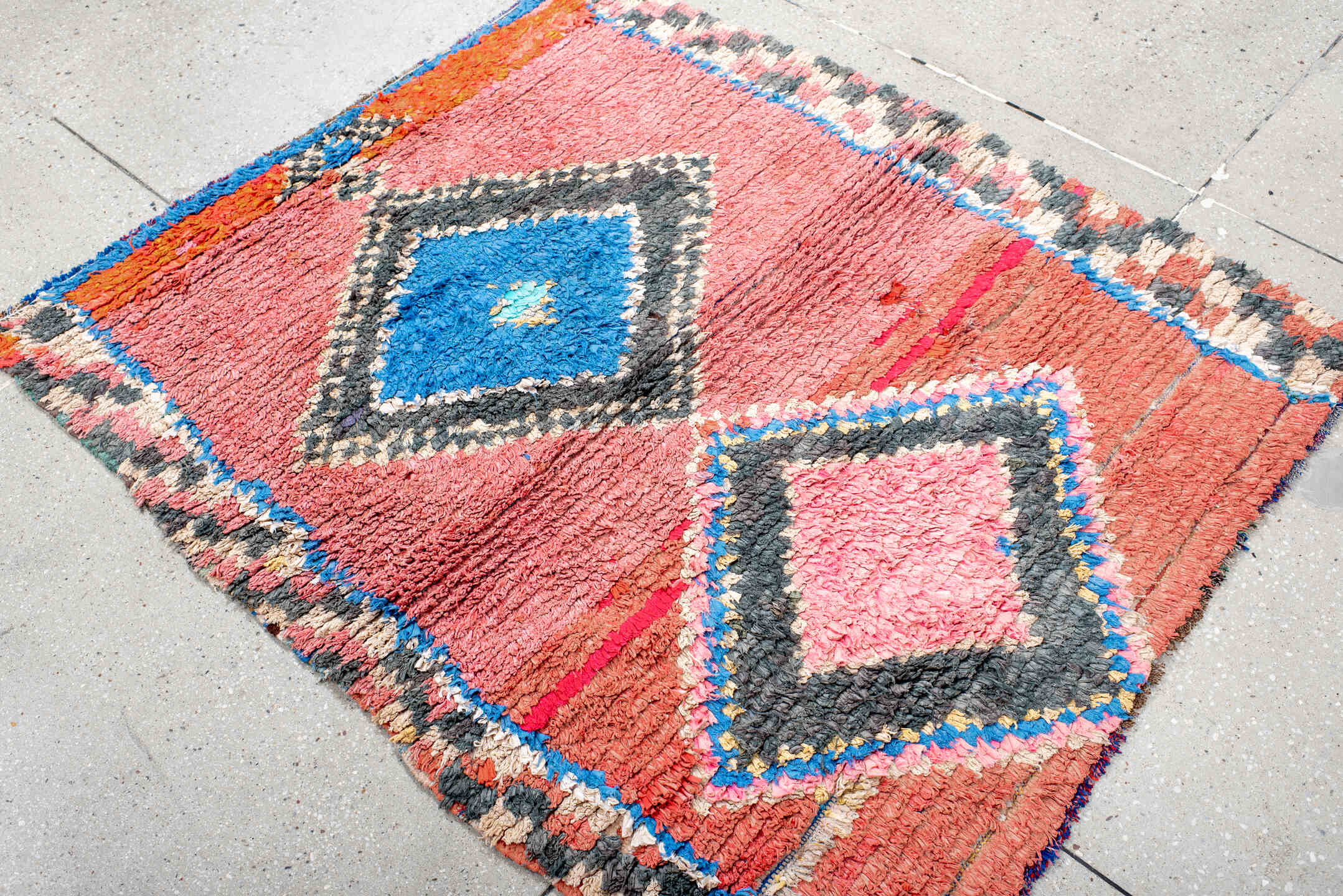3' x 4' one-of-a-kind handmade vintage Rag Rug small size rug. Color palette: rose, charcoal, ivory, electric blue, coral