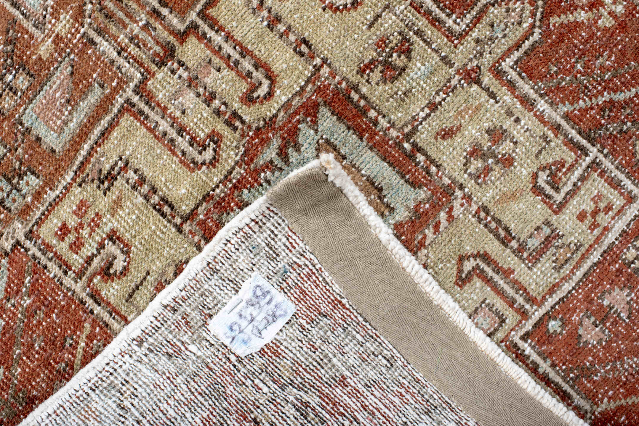 2' x 10' one-of-a-kind handmade antique Karaje runner rug. Color palette: rust, ivory, pale blue, taupe, charcoal, camel