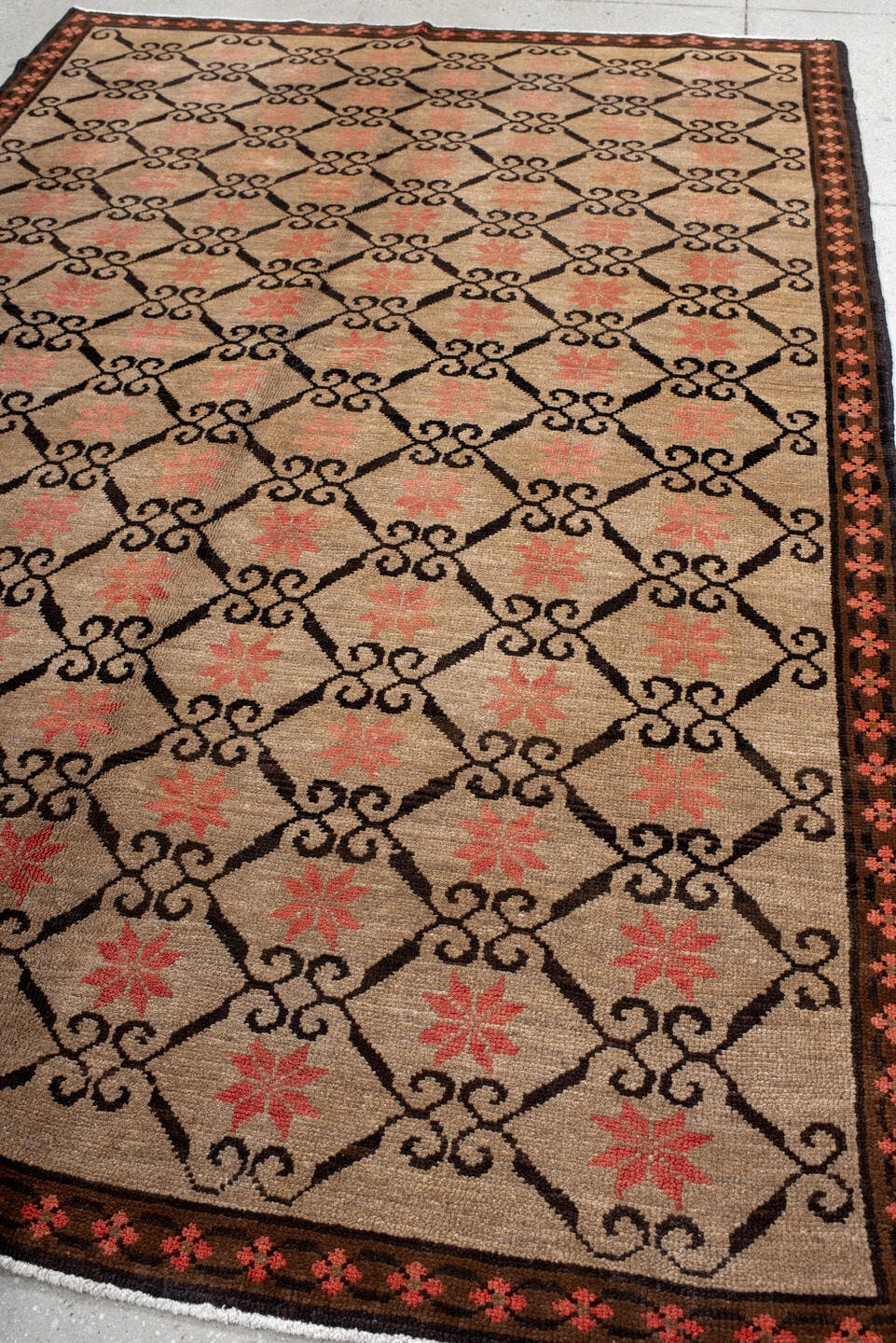 6' x 9' one-of-a-kind handmade antique Kars medium size rug. Color palette: ivory, brown, coral, charcoal, rose, terracotta