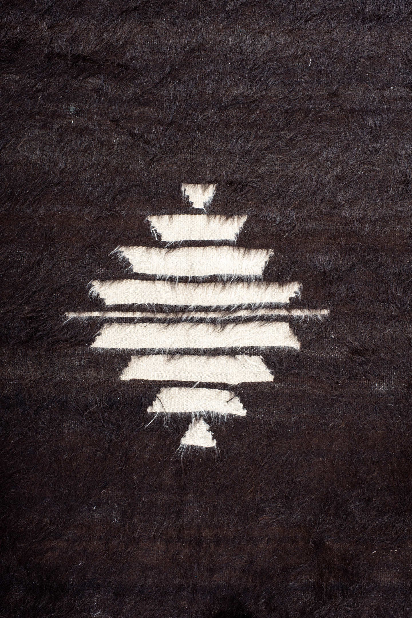 4' x 6' one-of-a-kind handmade antique Tulu small size rug. Color palette: brown, camel, ivory, charcoal, beige, gray, black