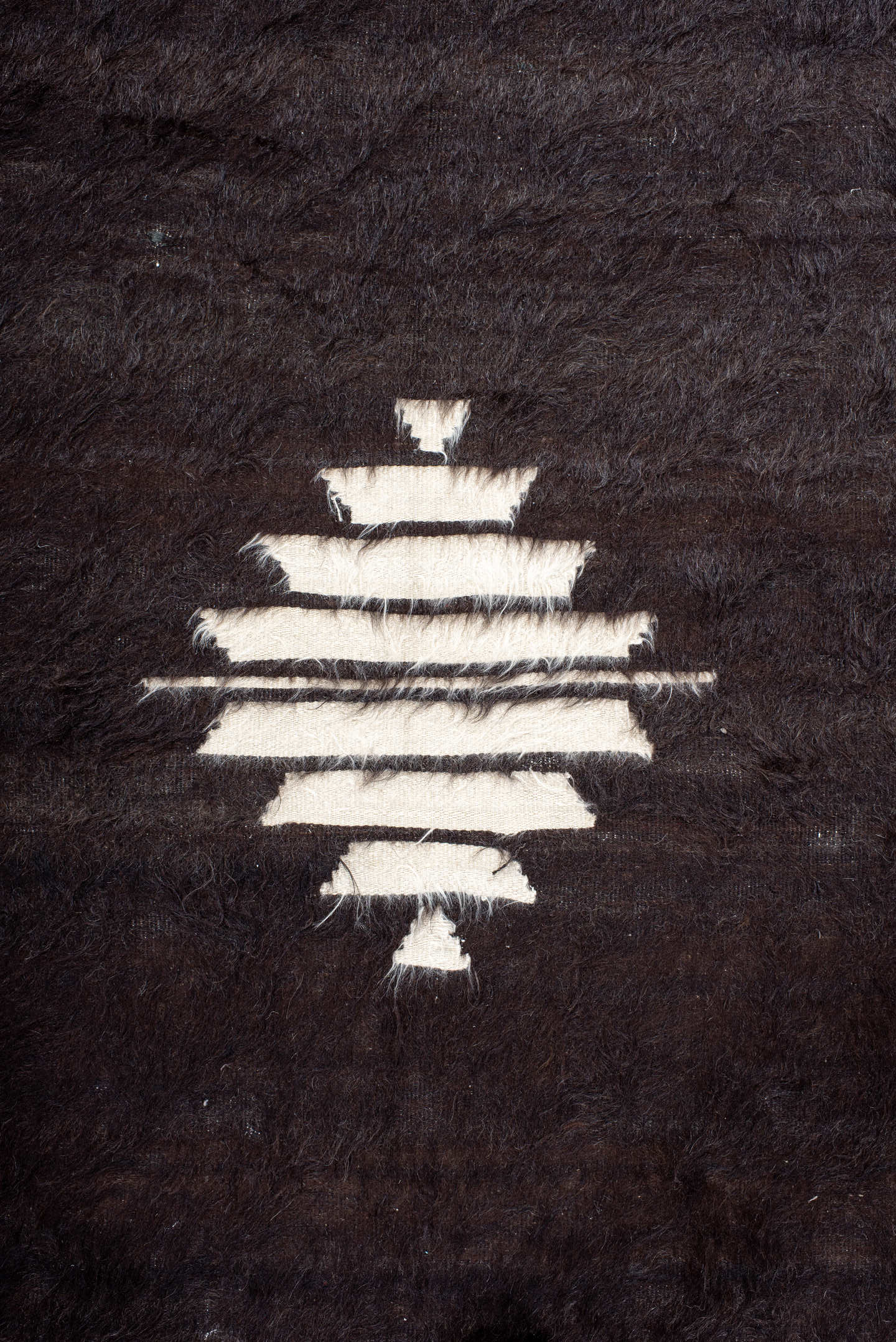 4' x 6' one-of-a-kind handmade antique Tulu small size rug. Color palette: brown, camel, ivory, charcoal, beige, gray, black