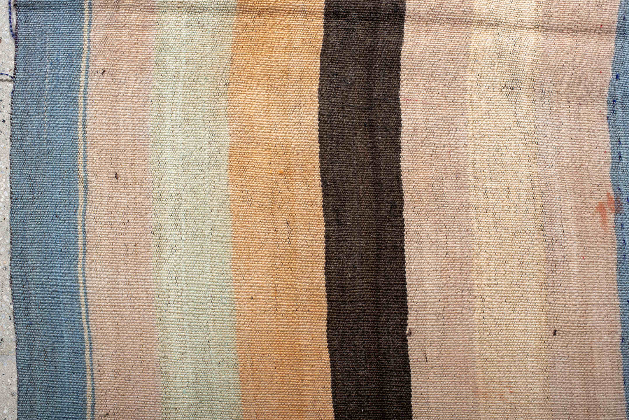 2' x 6' one-of-a-kind handmade vintage runner rug. Color palette: ivory, pale blue, peach, brown, cream, charcoal, lavender