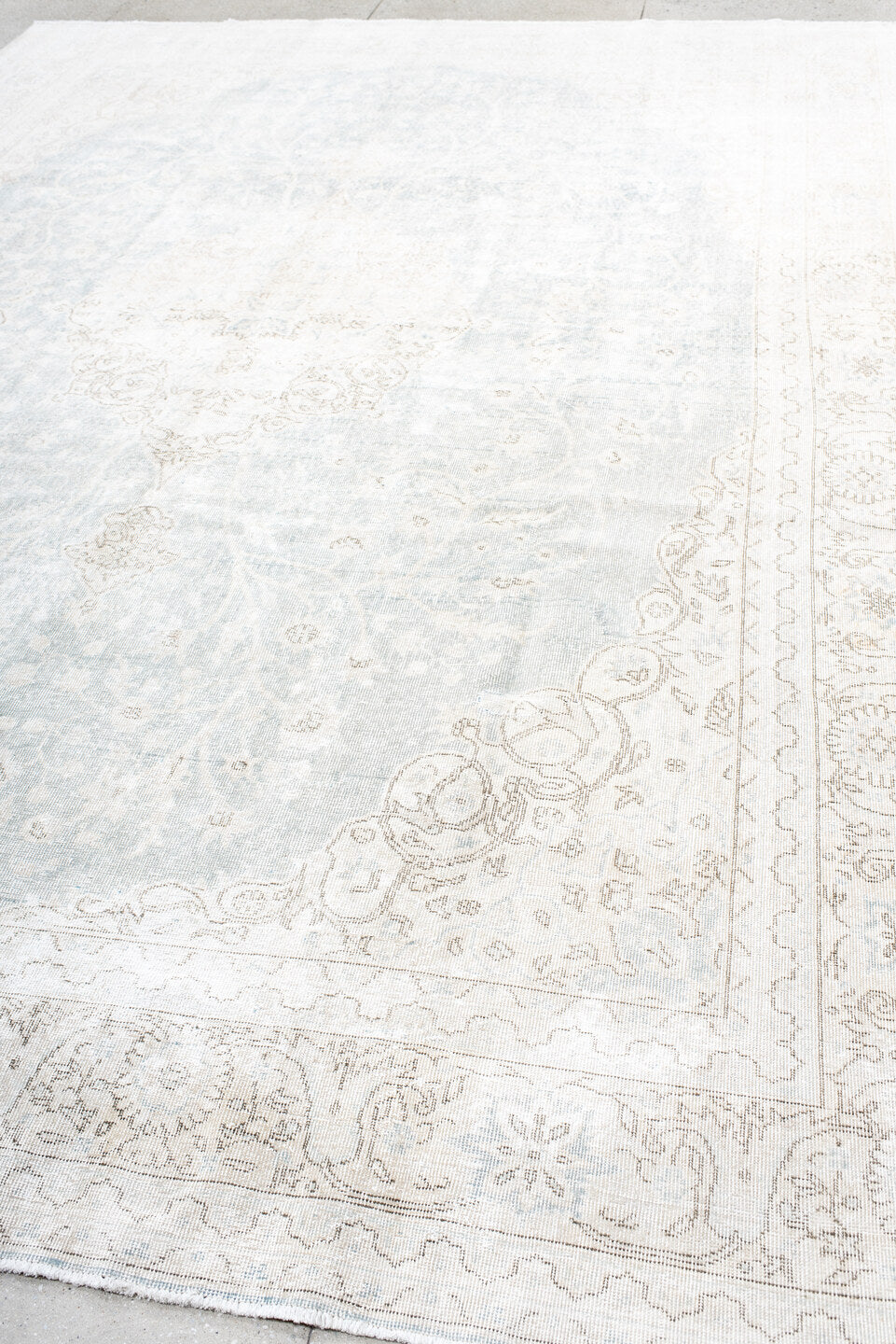 9' x 13' one-of-a-kind handmade antique Sparta large size rug. Color palette: ivory, pale blue, beige, cream, taupe