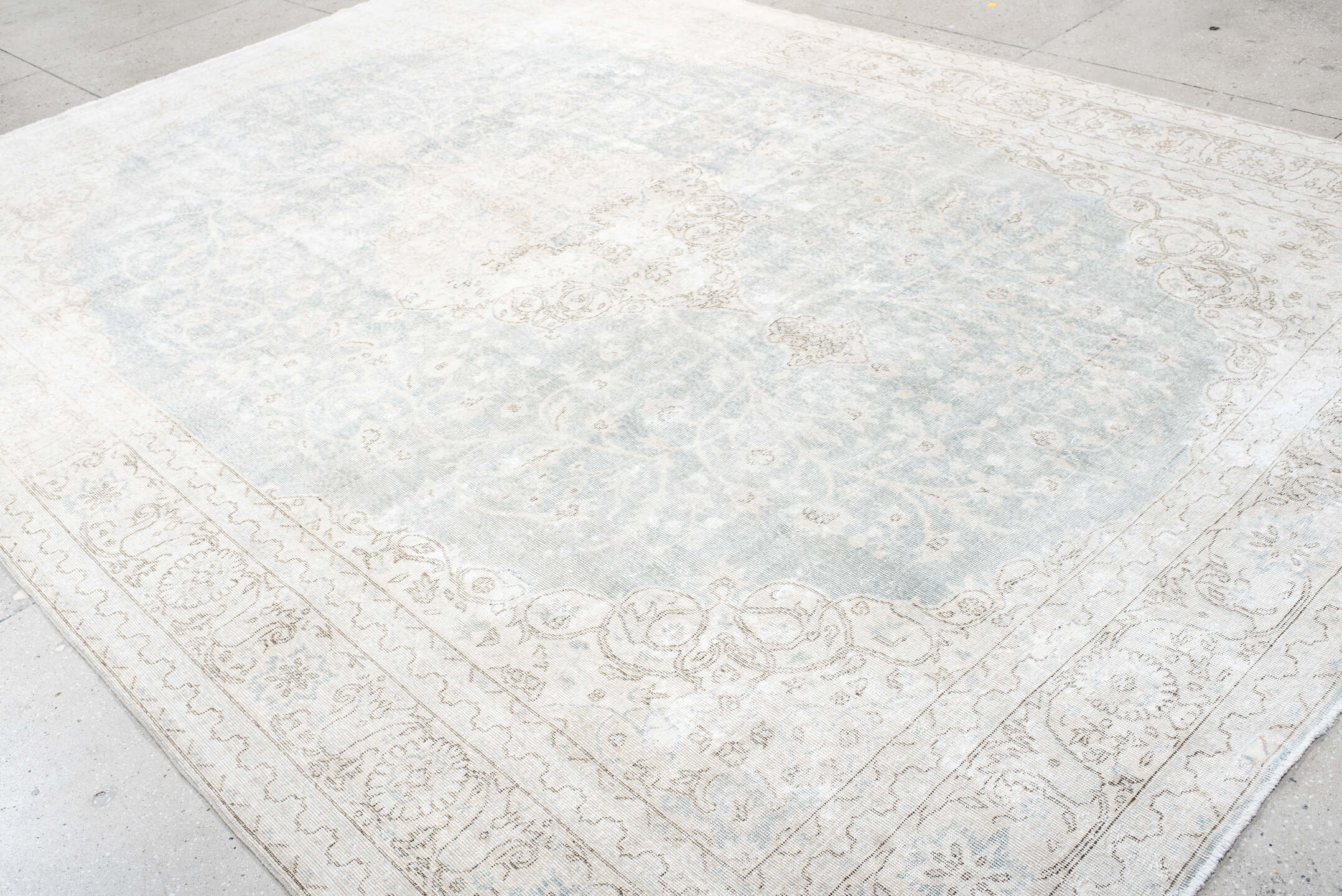 9' x 13' one-of-a-kind handmade antique Sparta large size rug. Color palette: ivory, pale blue, beige, cream, taupe