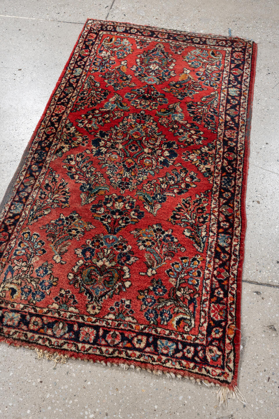 2' x 4' one-of-a-kind handmade antique Sarouk small size rug. Color palette: rust, navy, ivory, sky blue, camel, saffron