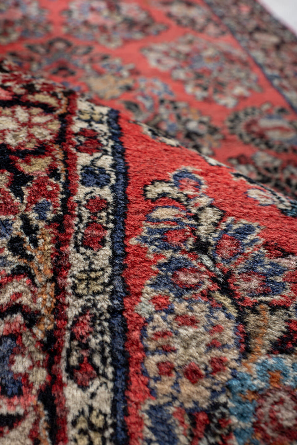 2' x 6' one-of-a-kind handmade antique Sarouk runner rug. Color palette: red, navy, ivory, rose, slate, burgundy, camel