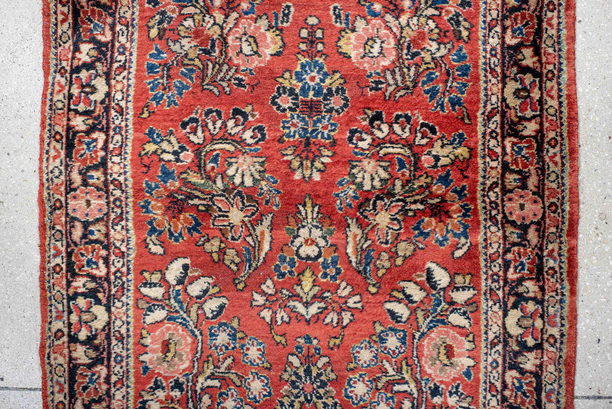 2' x 18' one-of-a-kind handmade antique Sarouk runner rug. Color palette: rust, ivory, navy, soft blue, rose, charcoal