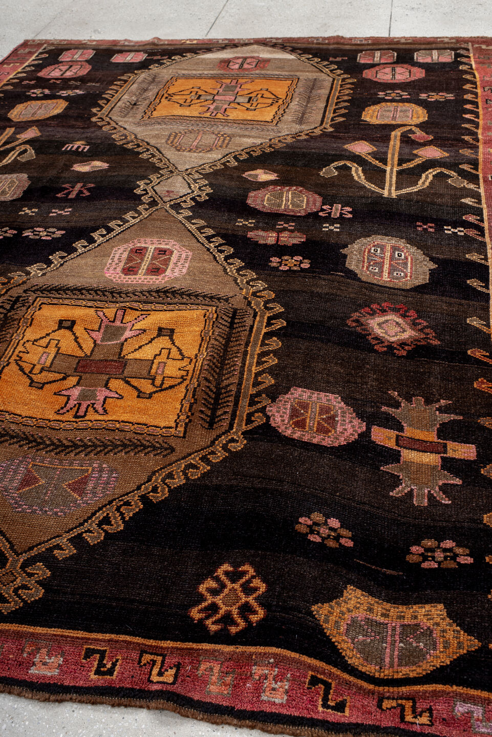 8' x 10' one-of-a-kind handmade vintage Kars large size rug. Color palette: black, brown, gray, off-white, orange, pink, red