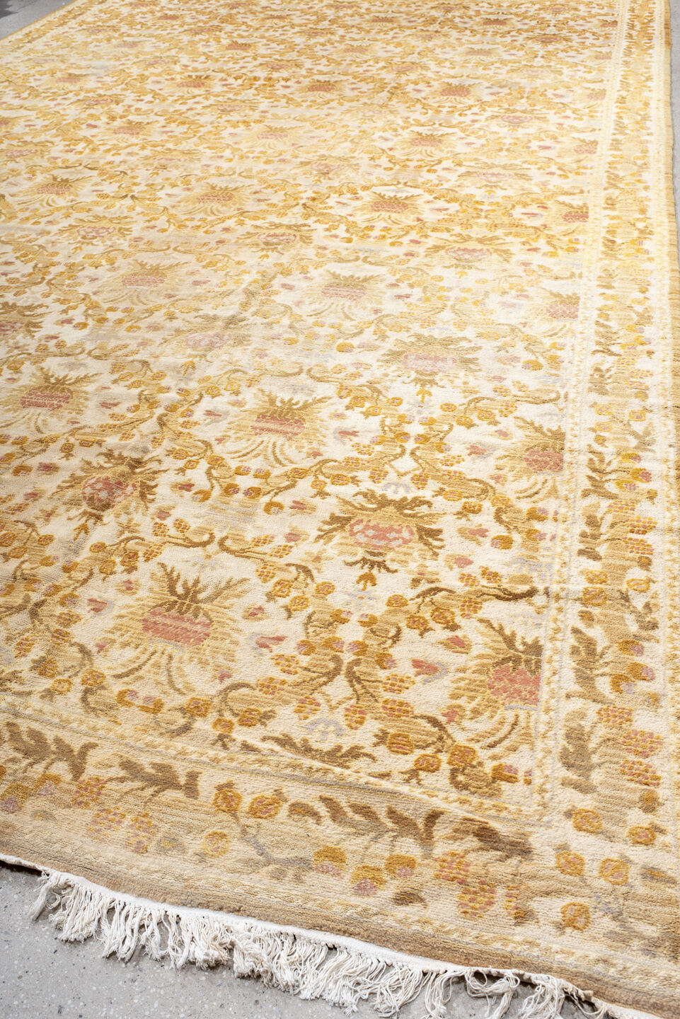 12' x 21' one-of-a-kind handmade vintage Cuenca oversize rug. Color palette: ivory, gold, camel, blush, cream, taupe, beige