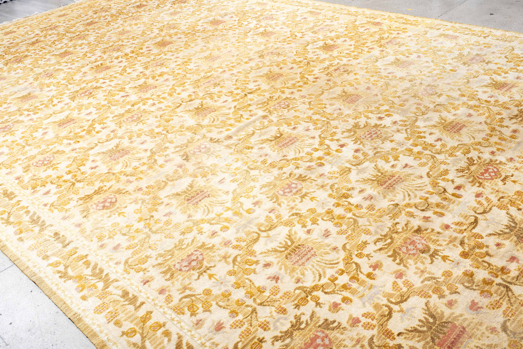 12' x 21' one-of-a-kind handmade vintage Cuenca oversize rug. Color palette: ivory, gold, camel, blush, cream, taupe, beige