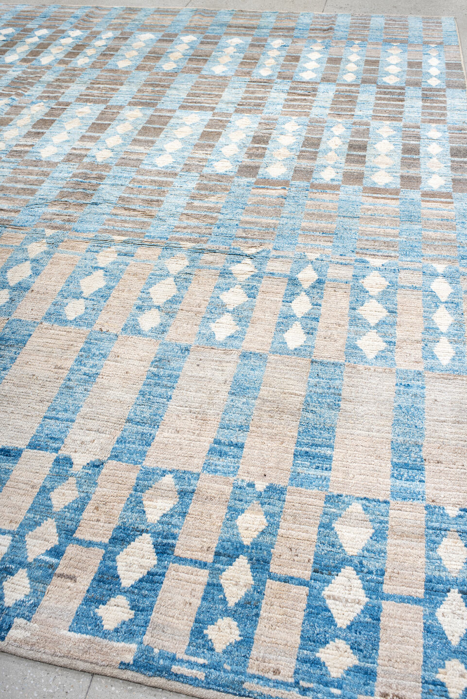 10' x 13' one-of-a-kind handmade vintage Tulu large size rug. Color palette: ivory, sky blue, taupe, gray, light blue, beige