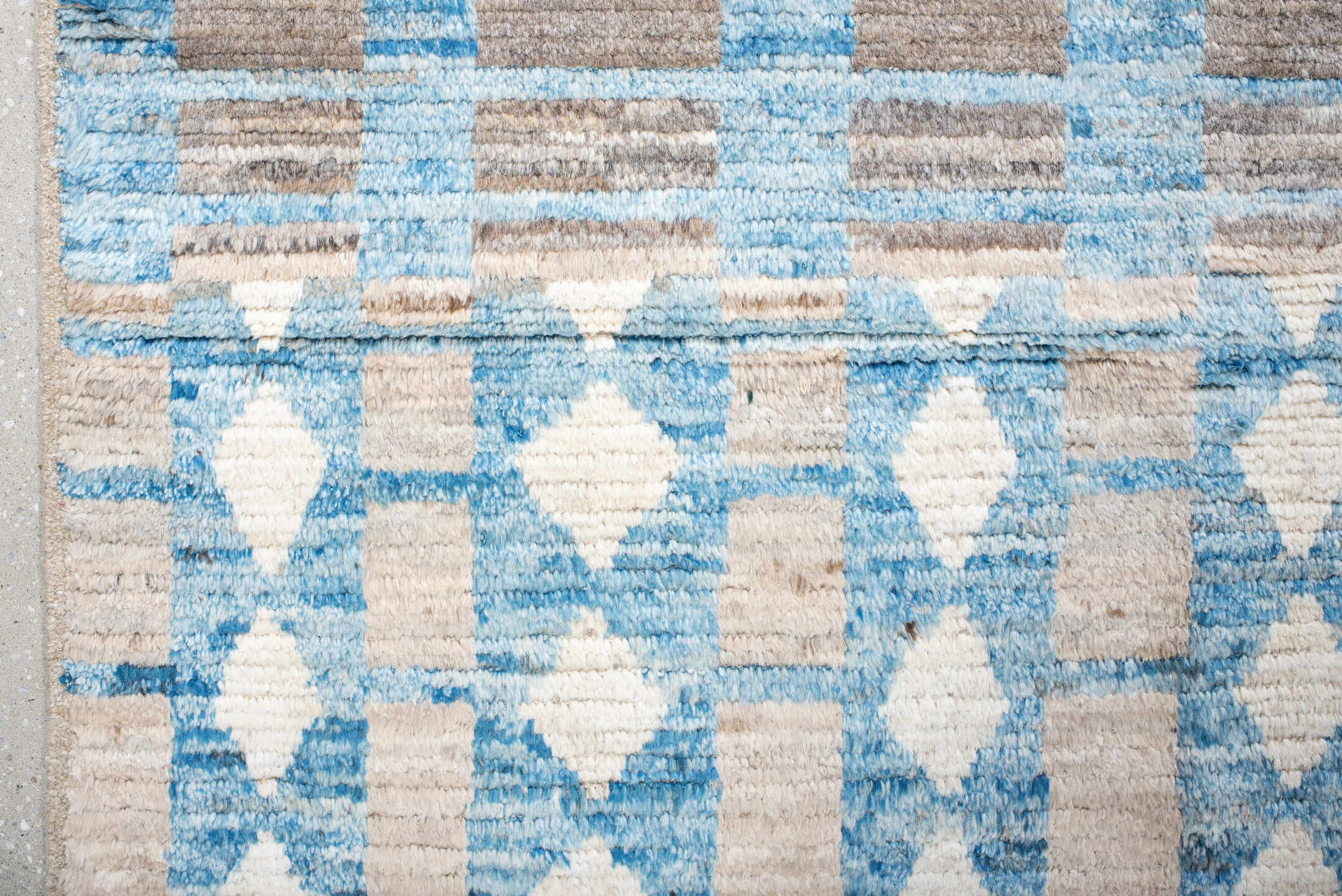 10' x 13' one-of-a-kind handmade vintage Tulu large size rug. Color palette: ivory, sky blue, taupe, gray, light blue, beige