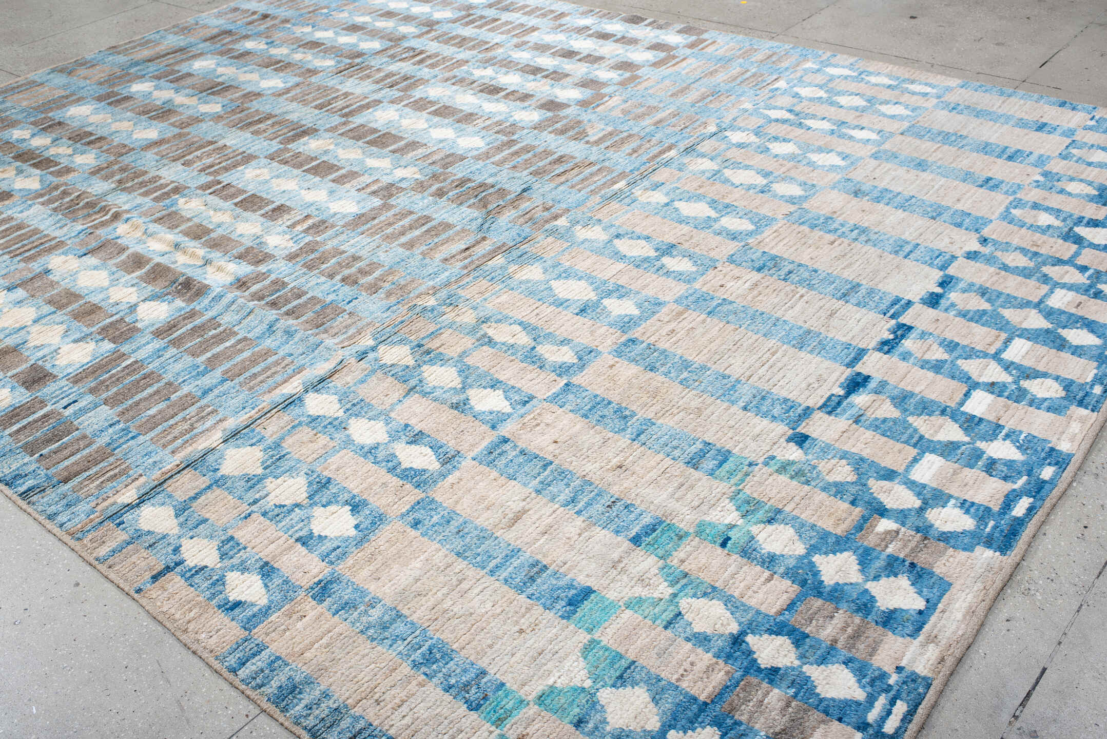 10' x 13' one-of-a-kind handmade vintage Tulu large size rug. Color palette: ivory, sky blue, taupe, gray, light blue, beige