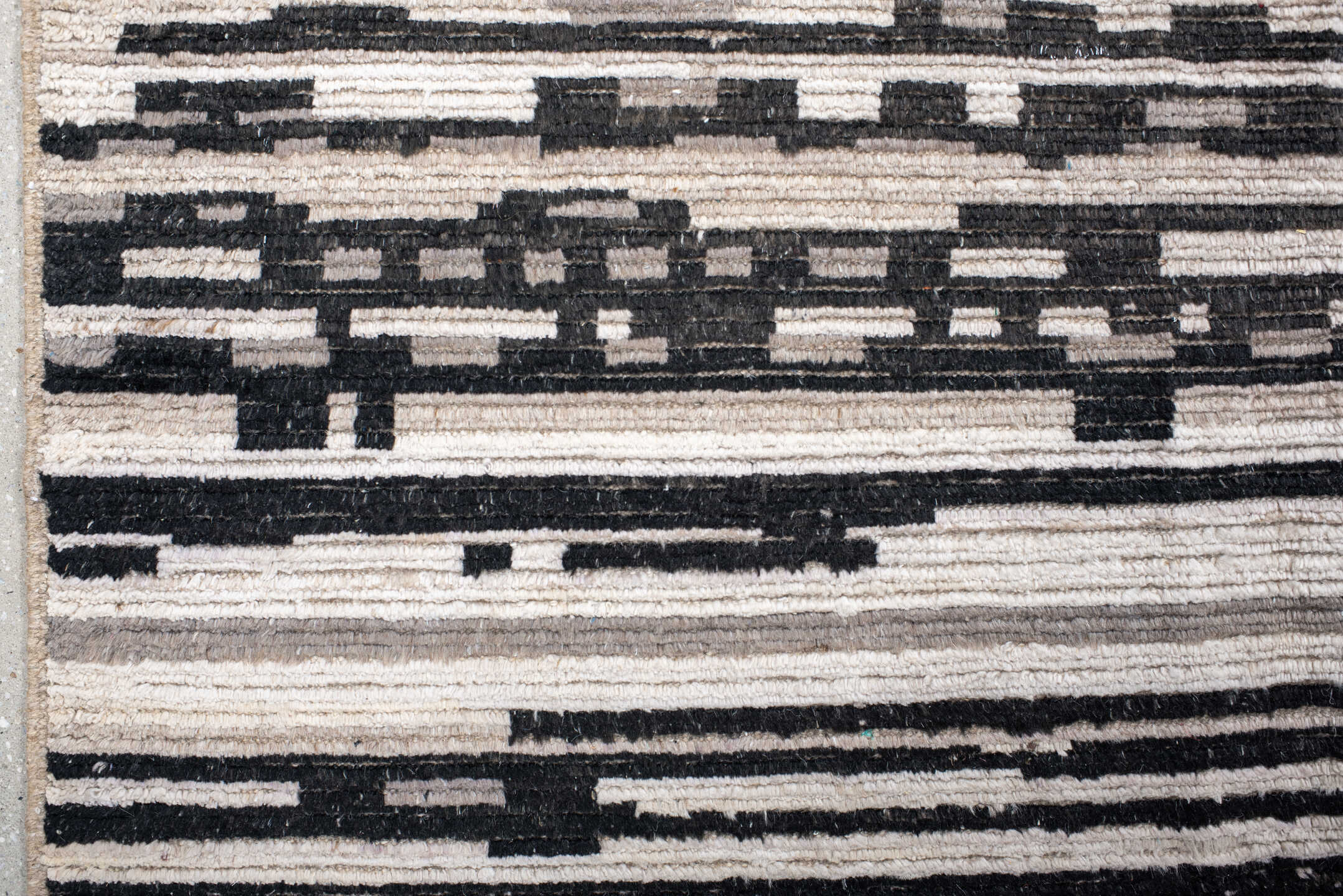 10' x 13' one-of-a-kind handmade vintage Tulu large size rug. Color palette: ivory, charcoal, gray, black, taupe, beige