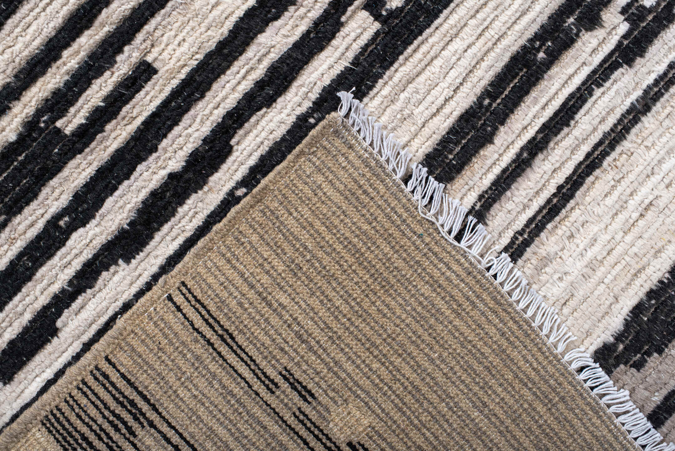 10' x 13' one-of-a-kind handmade vintage Tulu large size rug. Color palette: ivory, charcoal, gray, black, taupe, beige