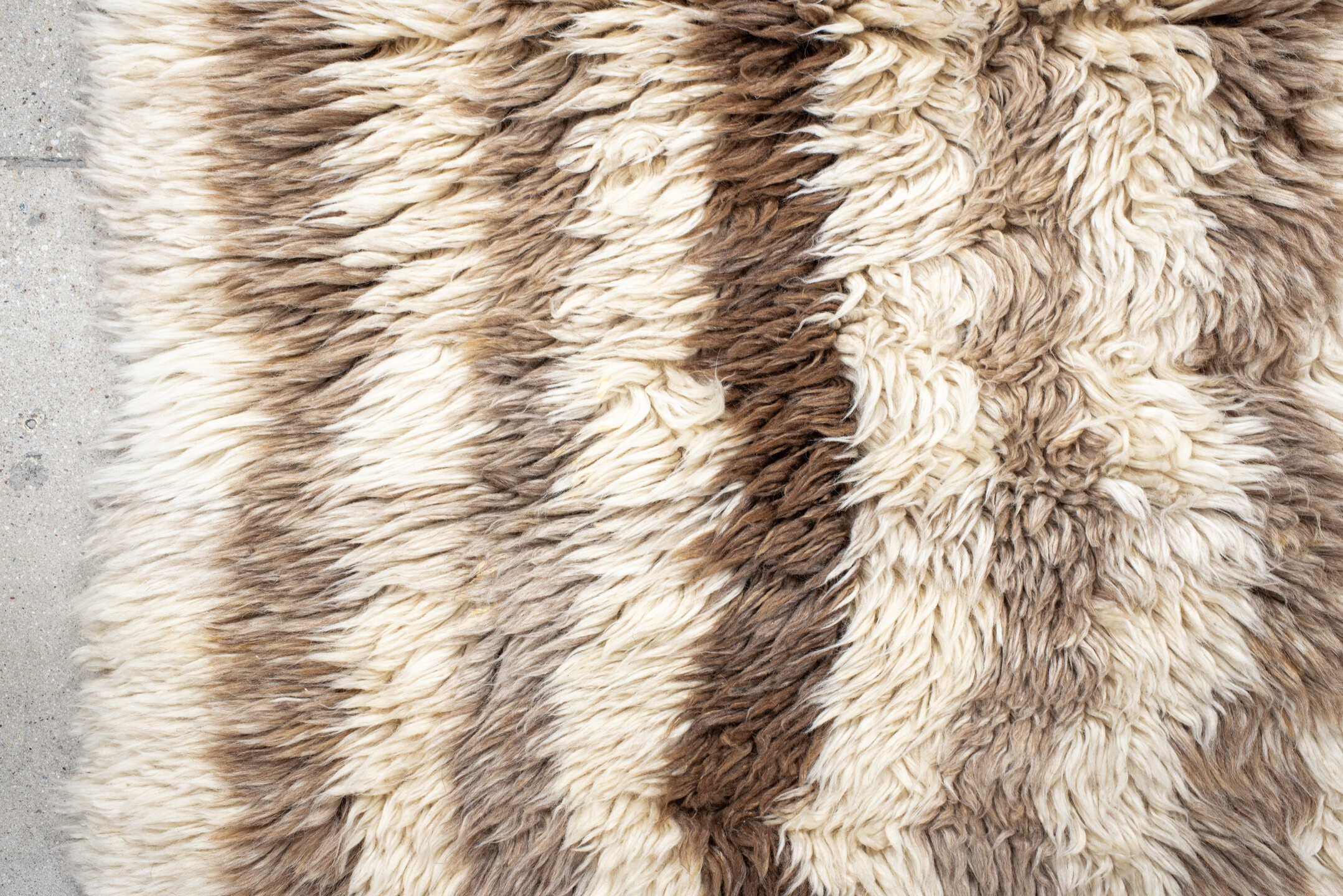 3' x 5' one-of-a-kind handmade vintage Moroccan small size rug. Color palette: antiquewhite, black, blanched almond, brown