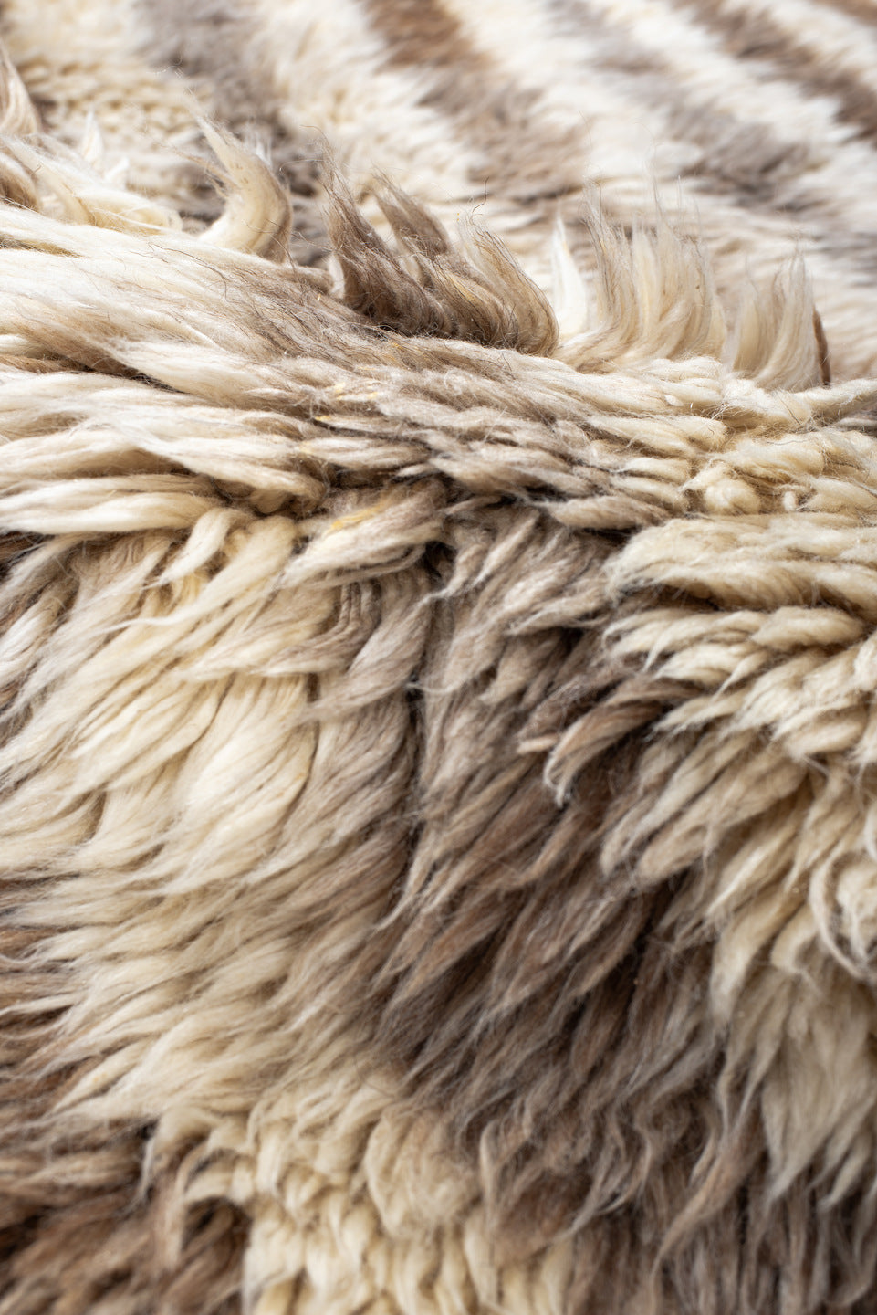 3' x 5' one-of-a-kind handmade vintage Moroccan small size rug. Color palette: antiquewhite, black, blanched almond, brown