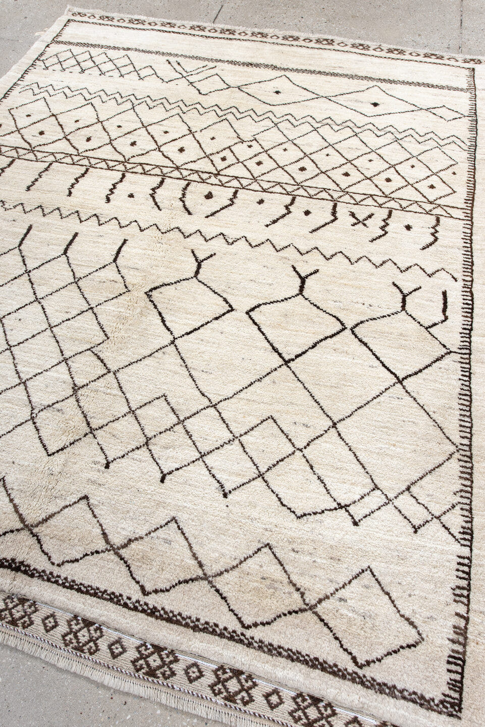 5' x 6' one-of-a-kind handmade vintage Moroccan rug. Color palette: ivory, brown, charcoal, taupe, gray, black, beige