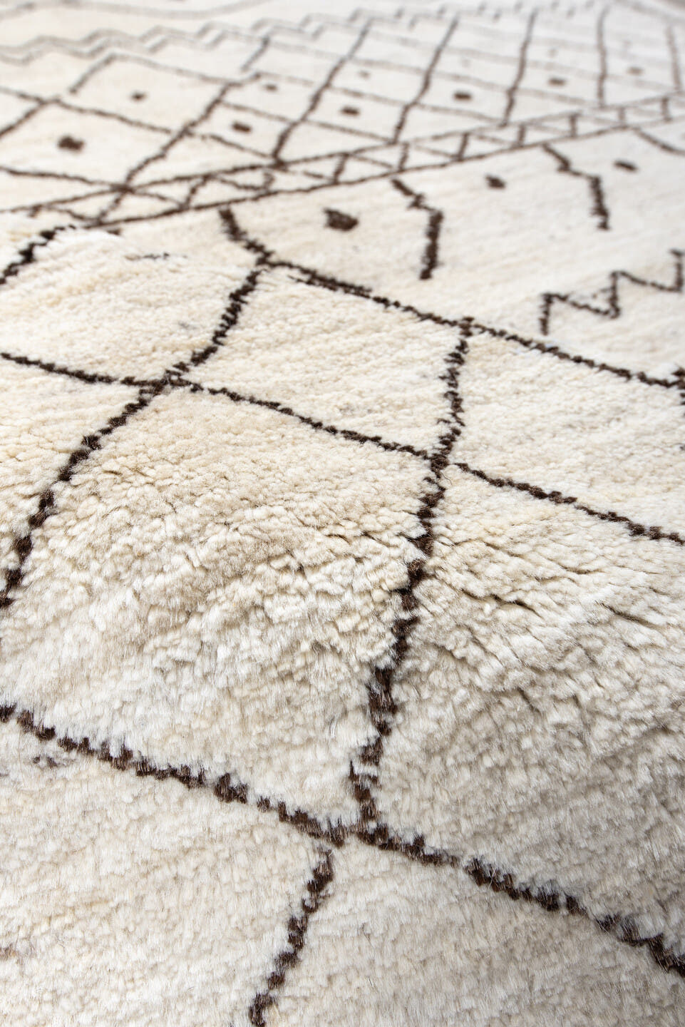 5' x 6' one-of-a-kind handmade vintage Moroccan rug. Color palette: ivory, brown, charcoal, taupe, gray, black, beige