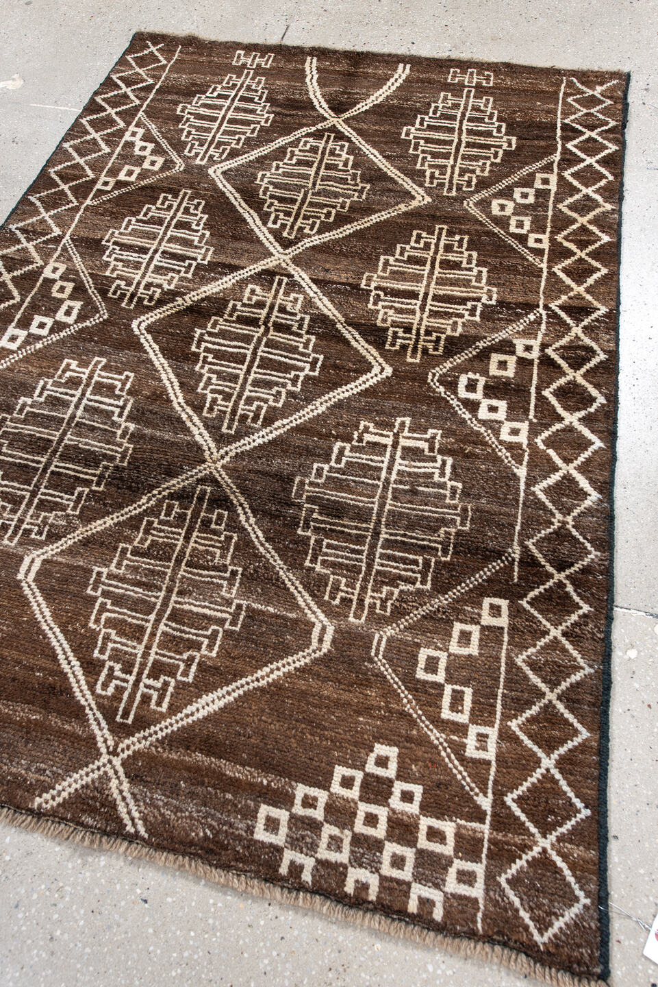 4' x 5' one-of-a-kind handmade vintage Moroccan small size rug. Color palette: brown, ivory, taupe, camel, beige, gray