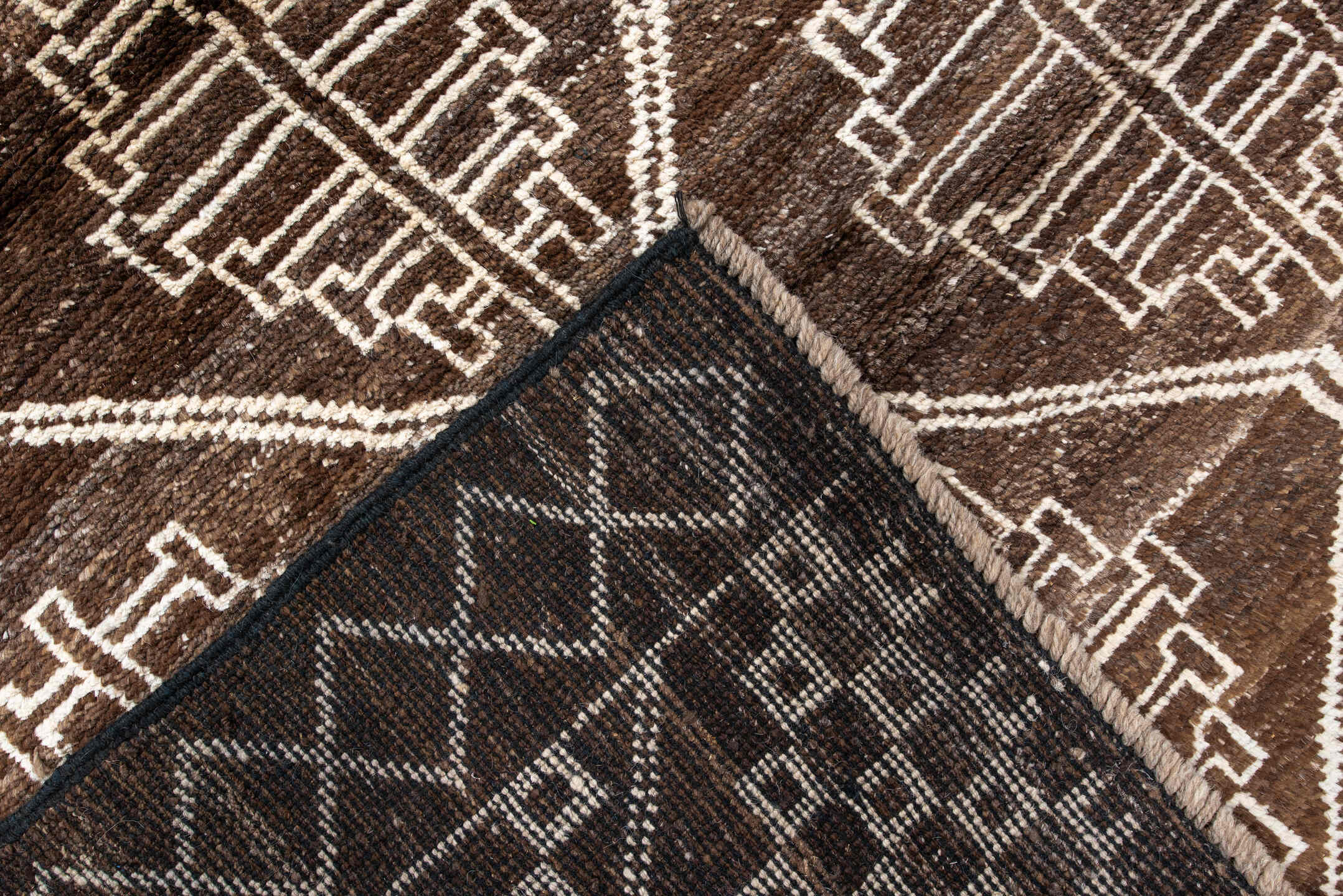 4' x 5' one-of-a-kind handmade vintage Moroccan small size rug. Color palette: antiquewhite, bisque, blanched almond, brown