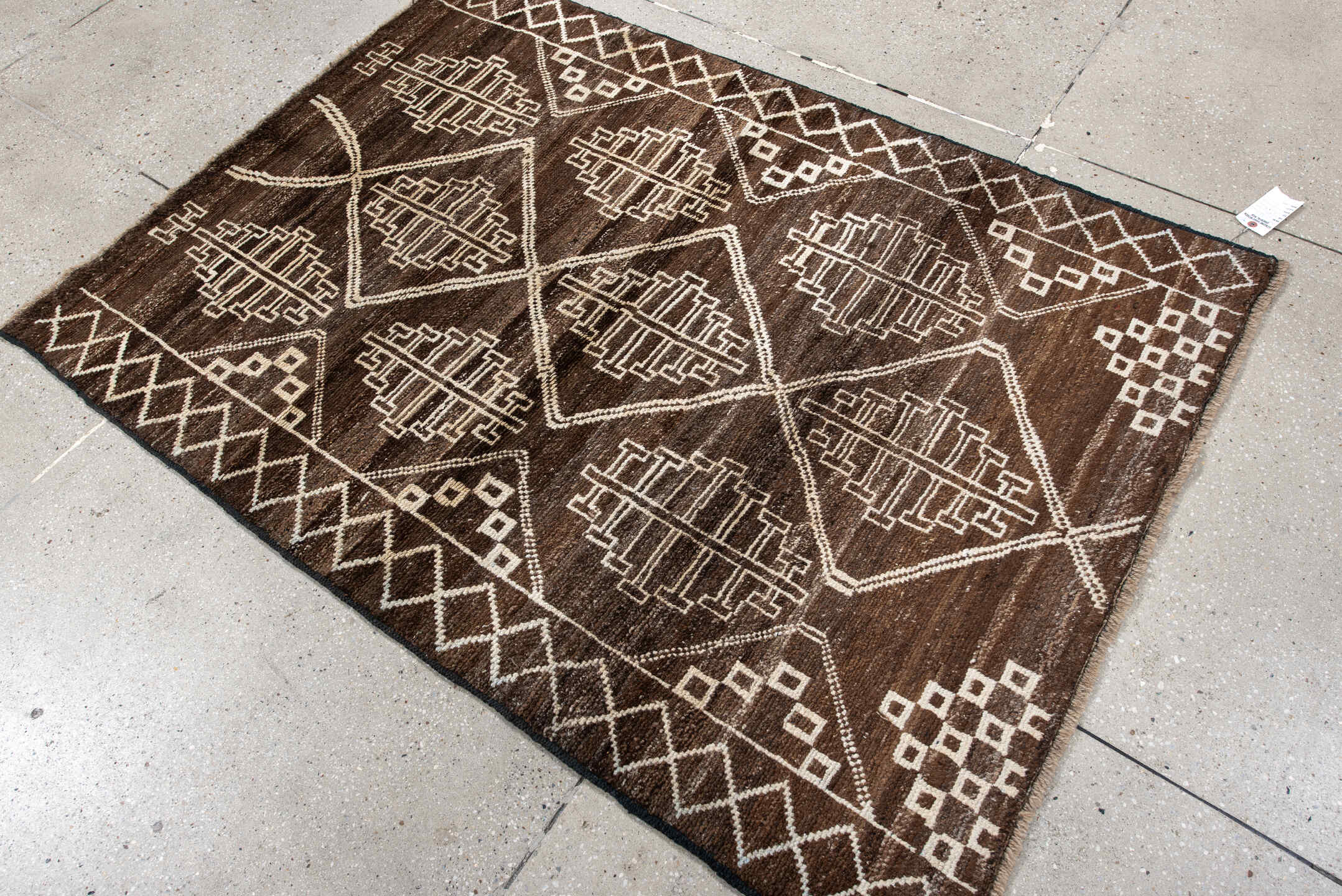 4' x 5' one-of-a-kind handmade vintage Moroccan small size rug. Color palette: brown, ivory, taupe, camel, beige, gray