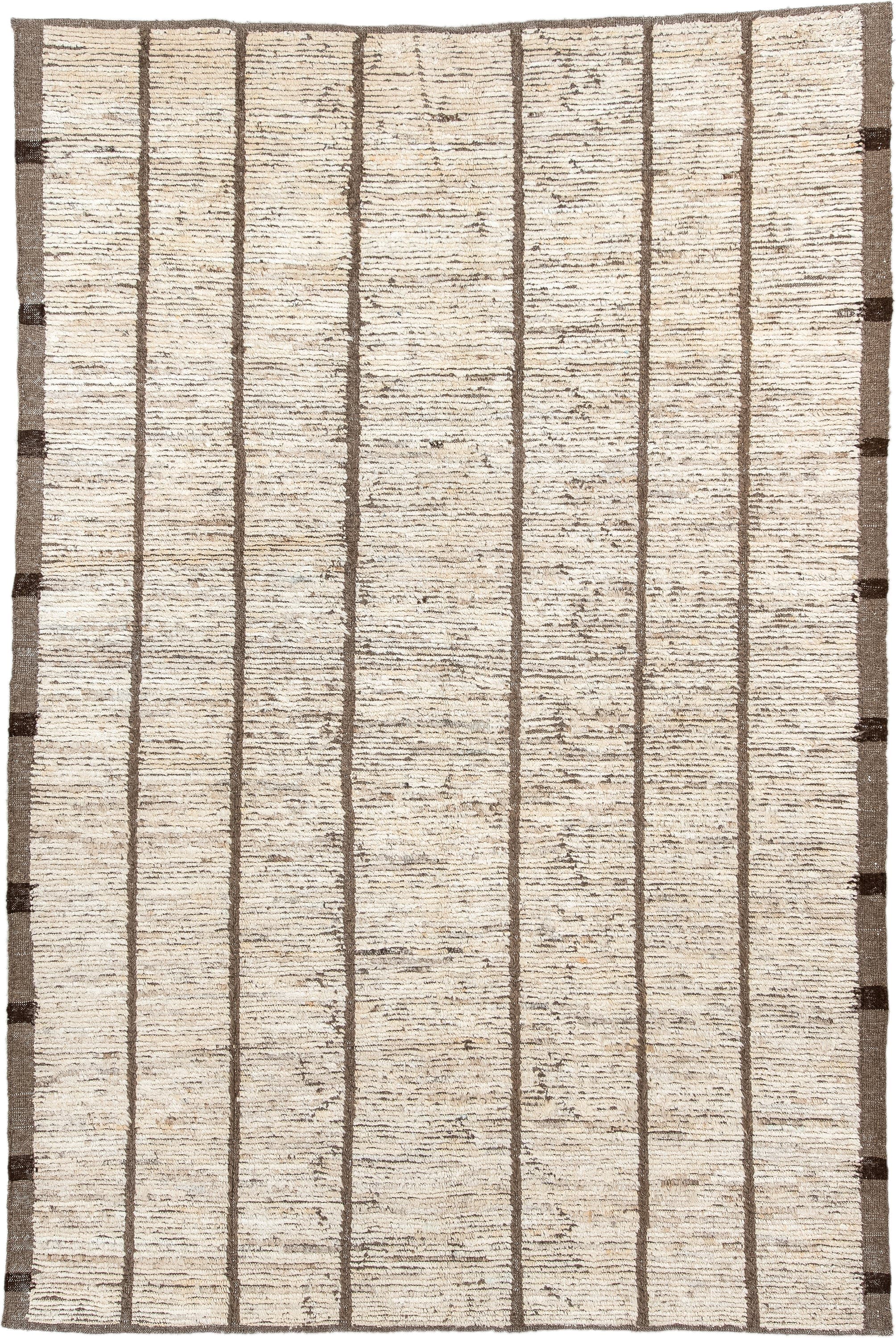 6' x 8' one-of-a-kind handmade vintage Tulu medium size rug. Color palette: ivory, taupe, brown, cream, charcoal, beige