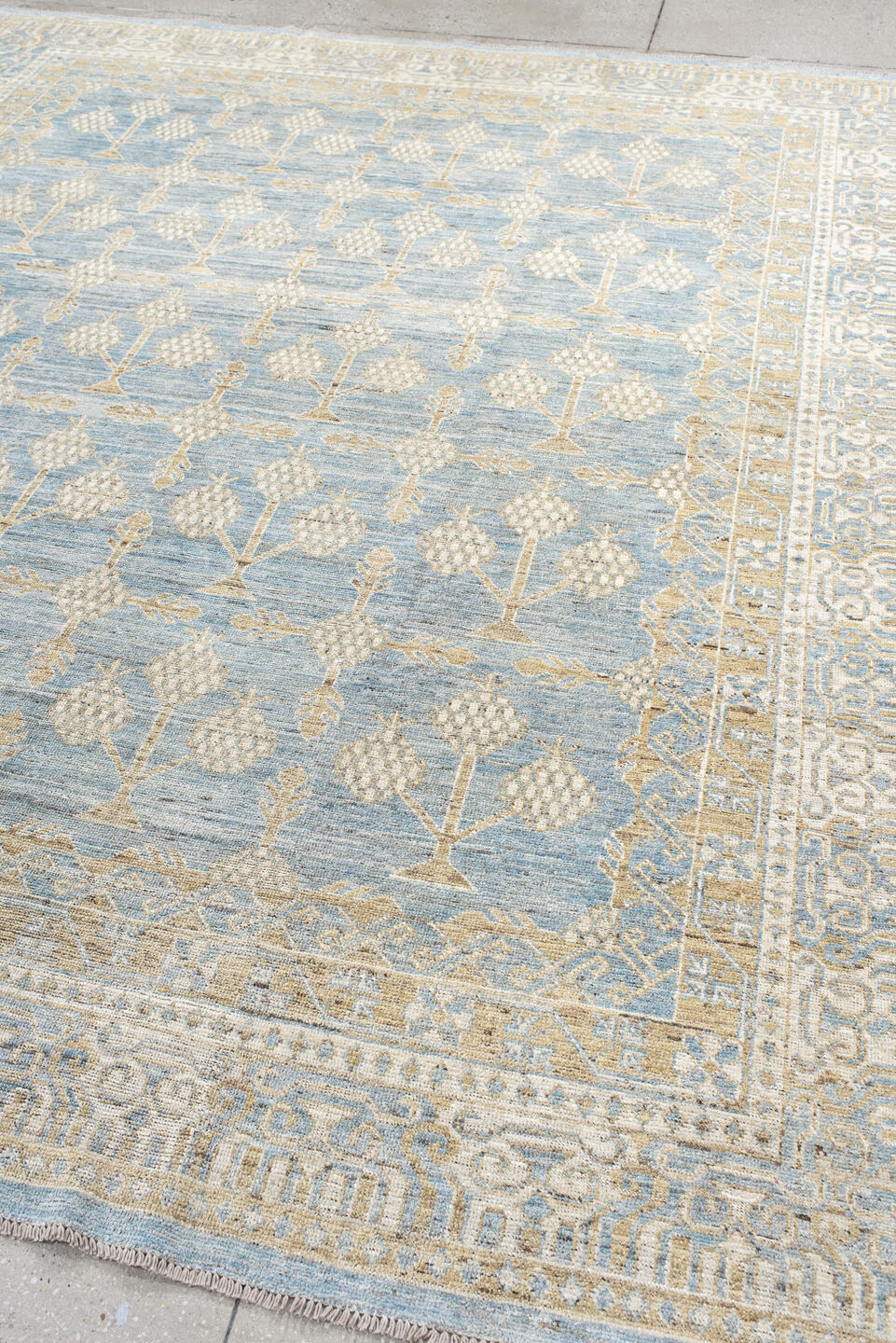 8' x 10' one-of-a-kind handmade vintage Khotan large size rug. Color palette: pale blue, ivory, cream, beige, light gold